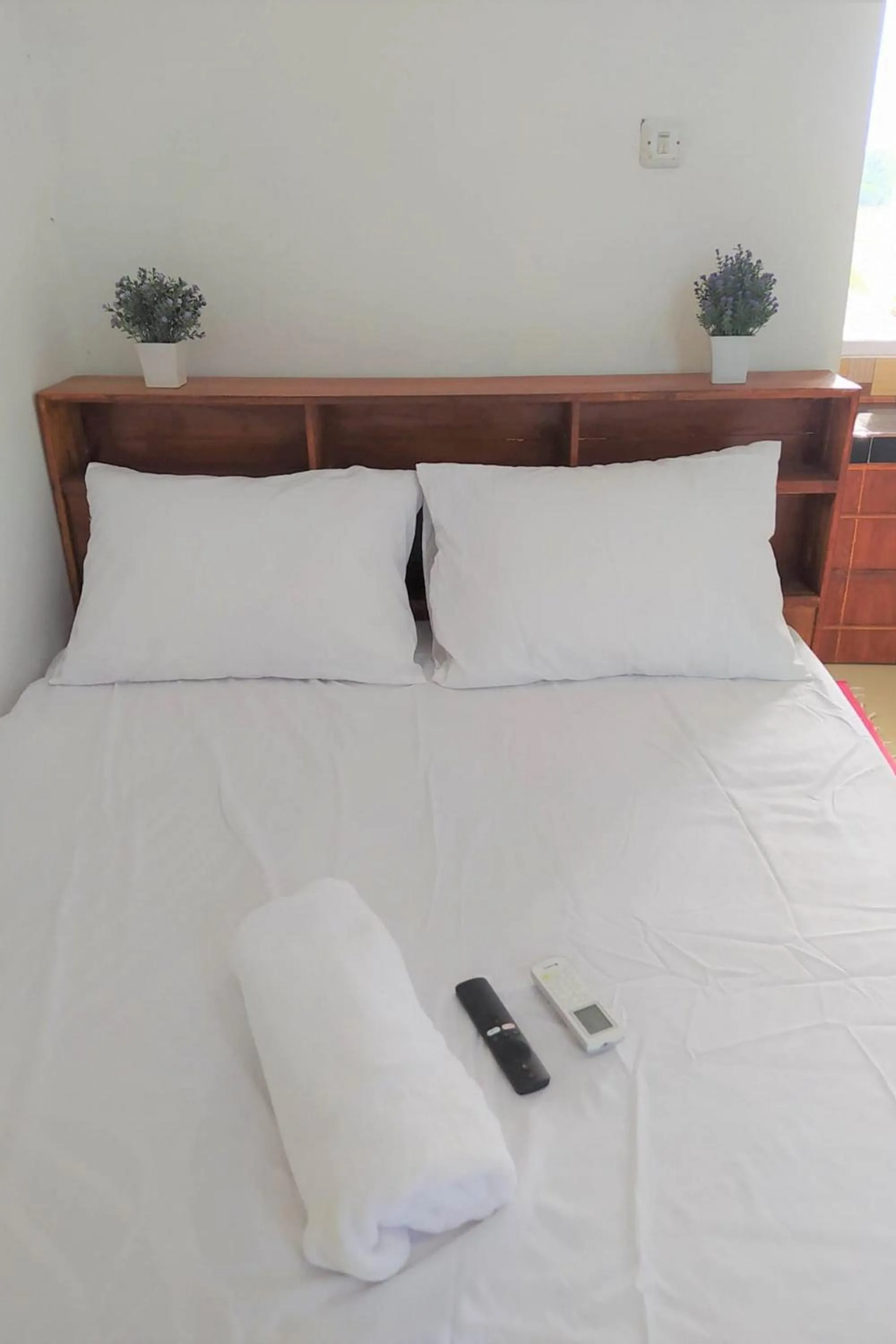 Bed in Guesthouse Berlian Batang Syariah near Kampung Kalisalak Park