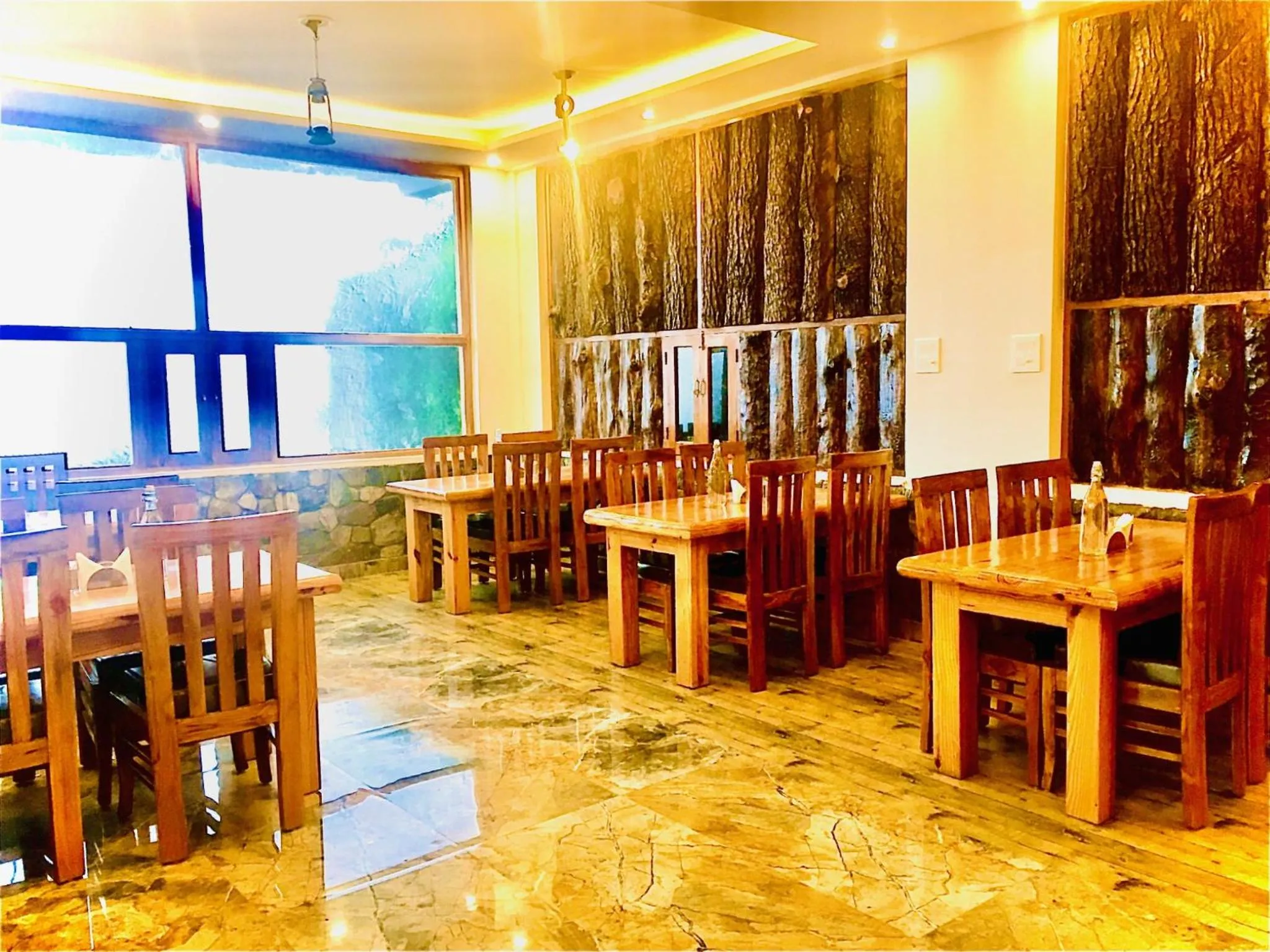 Restaurant/places to eat in LA Riqueza Kanatal - Mountain View Rooms - Best Location - Amazing Food - Close to Jungle Safari & Adventure Activities