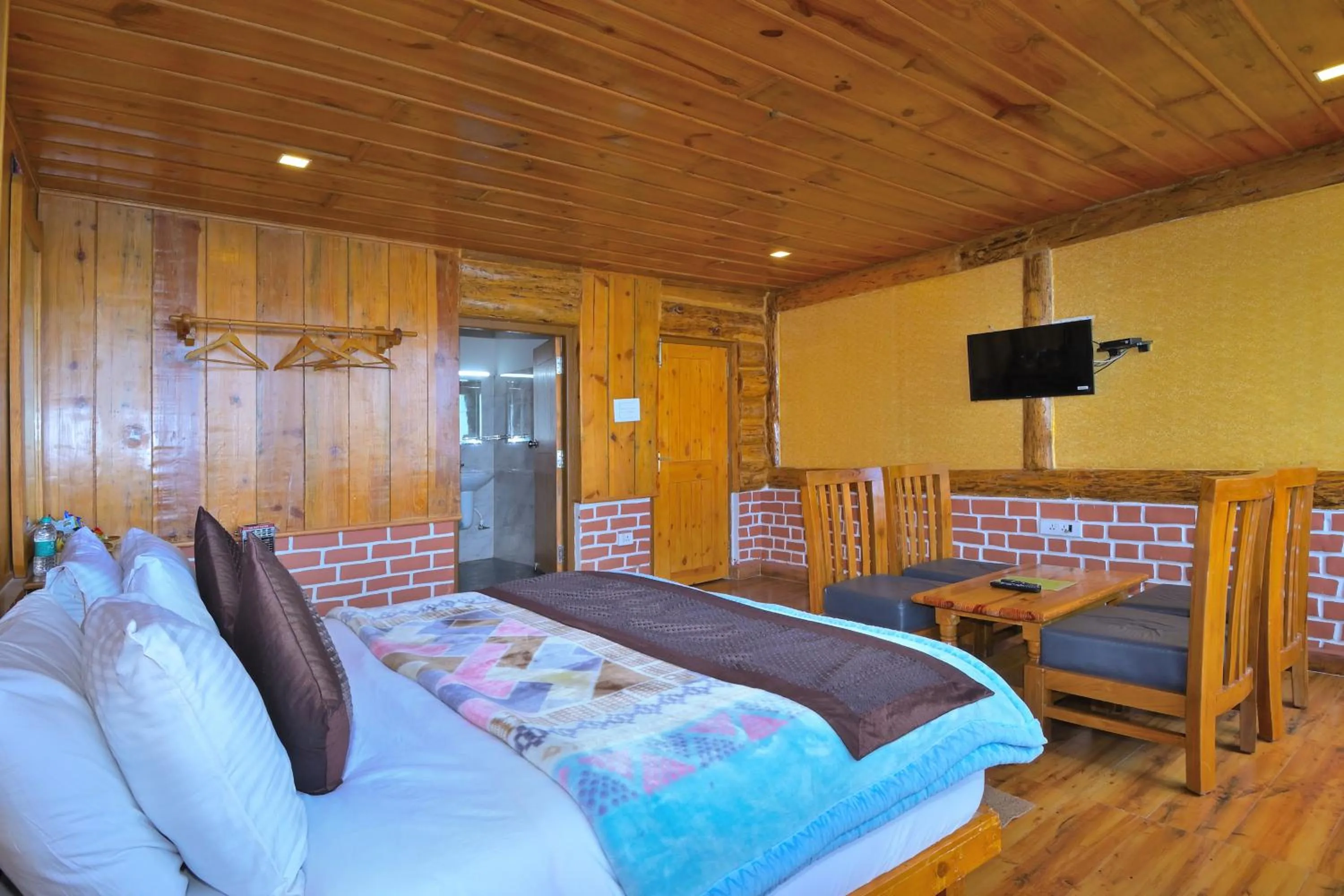 Bedroom in LA Riqueza Kanatal - Mountain View Rooms - Best Location - Amazing Food - Close to Jungle Safari & Adventure Activities