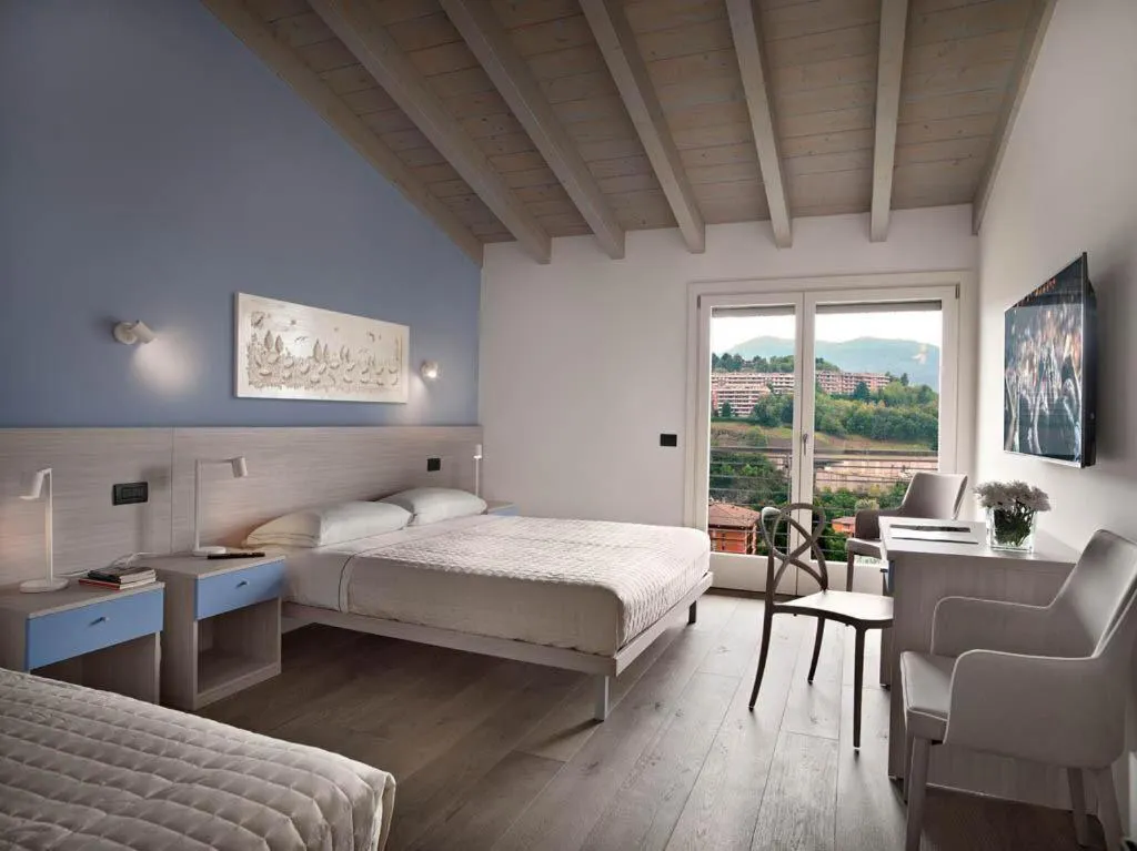 Bed in Residence Caffè Maya