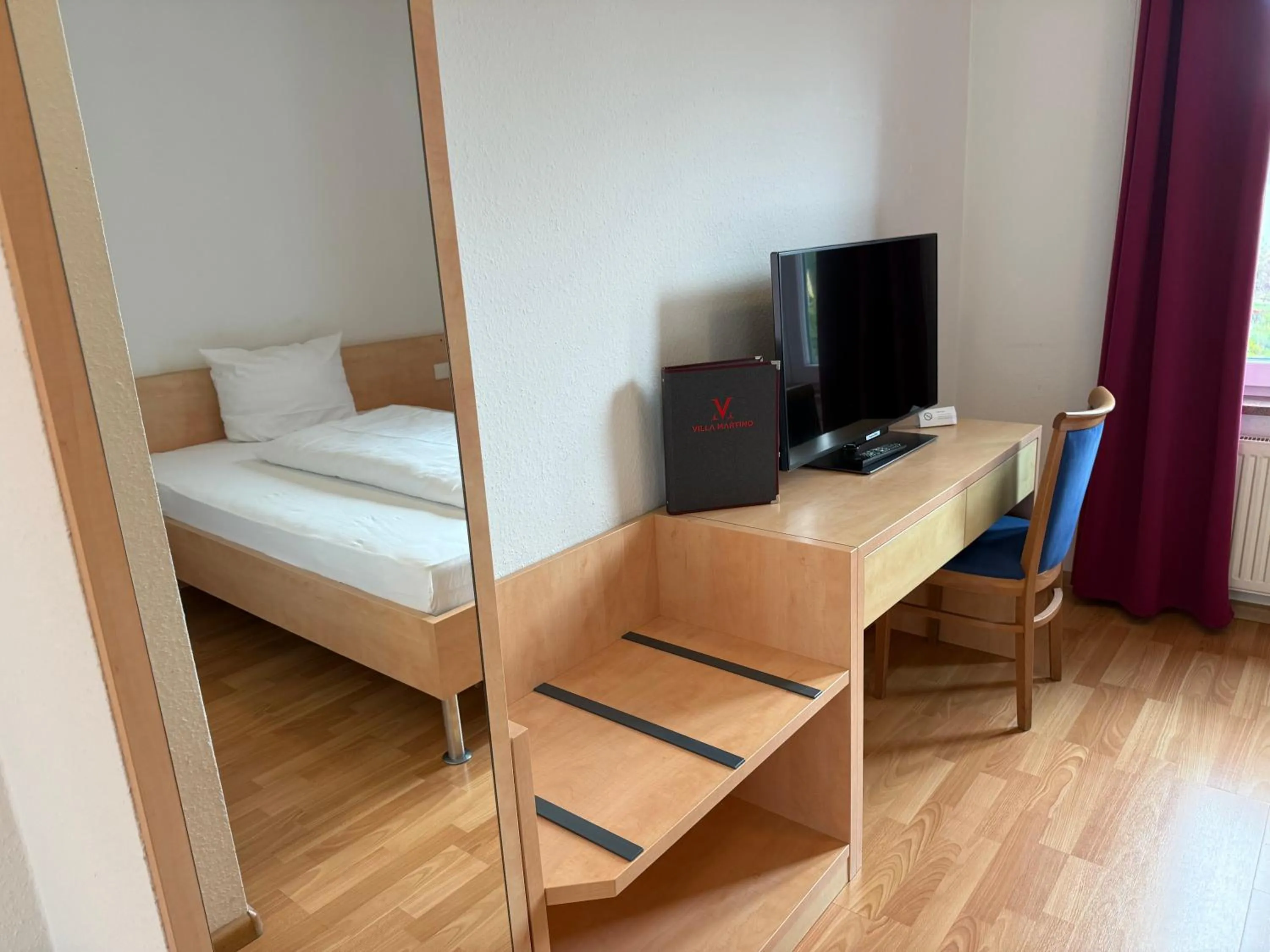 Bed in Hotel Villa Martino - zum Hirsch