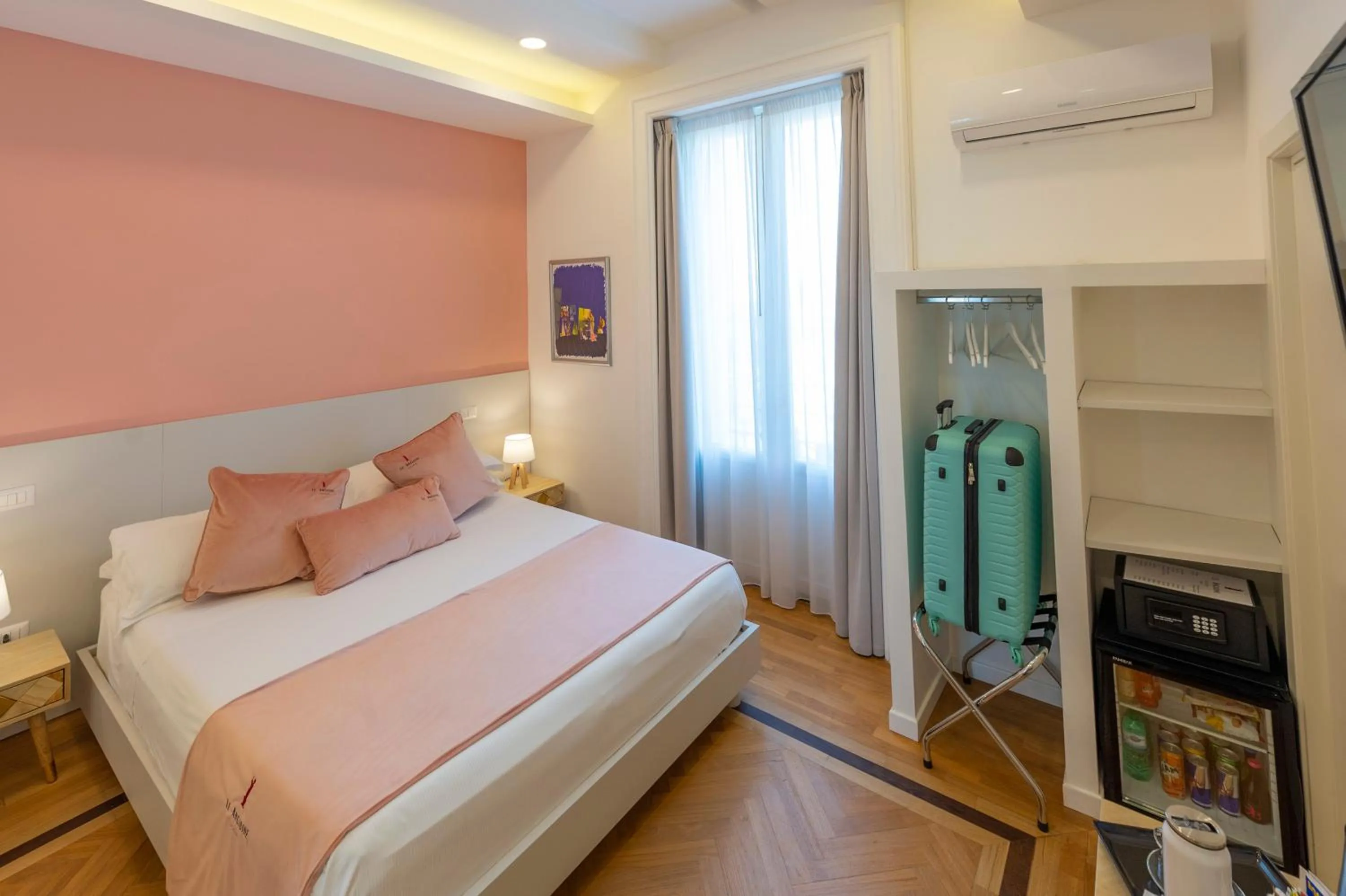 Bed in Le Angioine Rooms