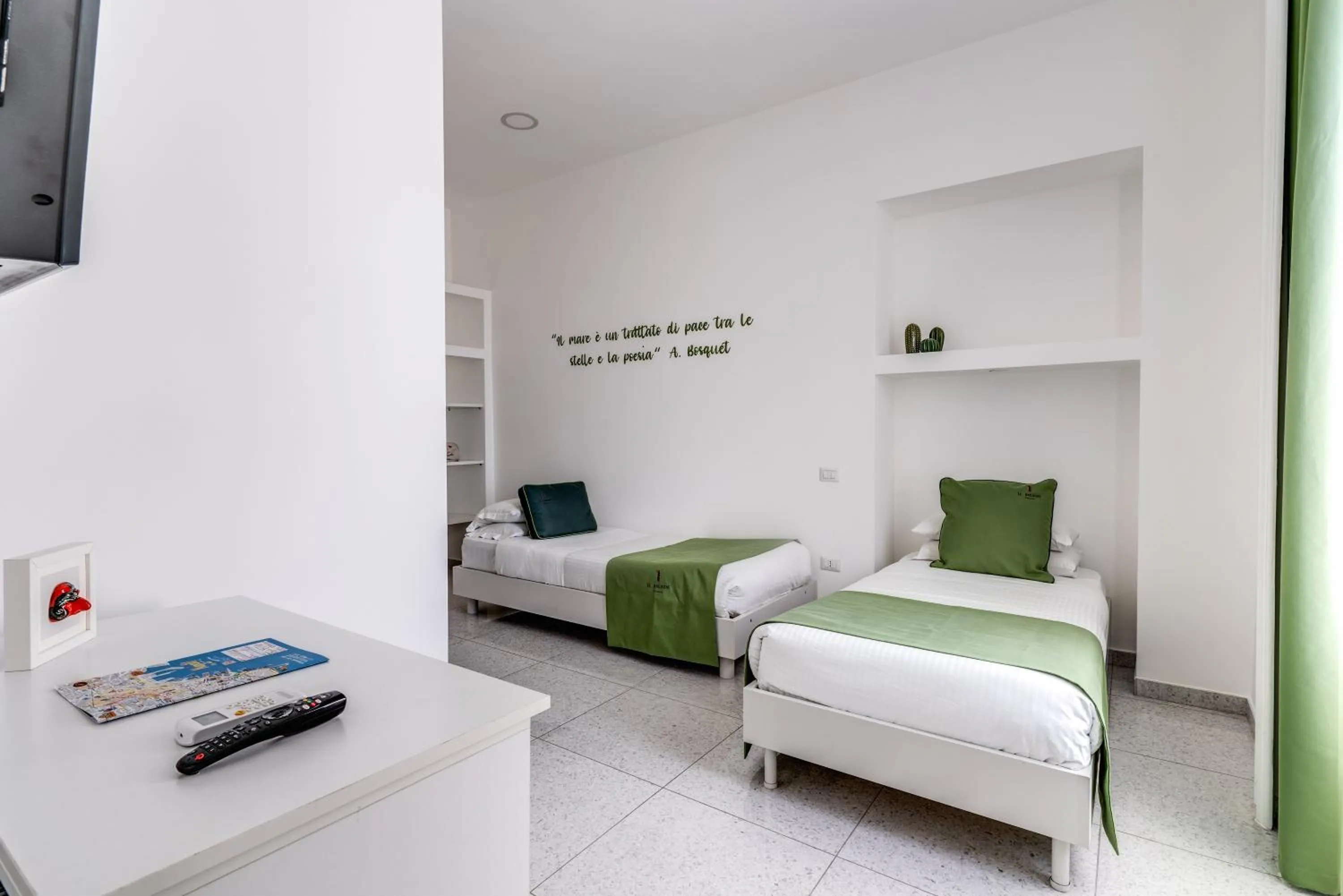 Bed in Le Angioine Rooms