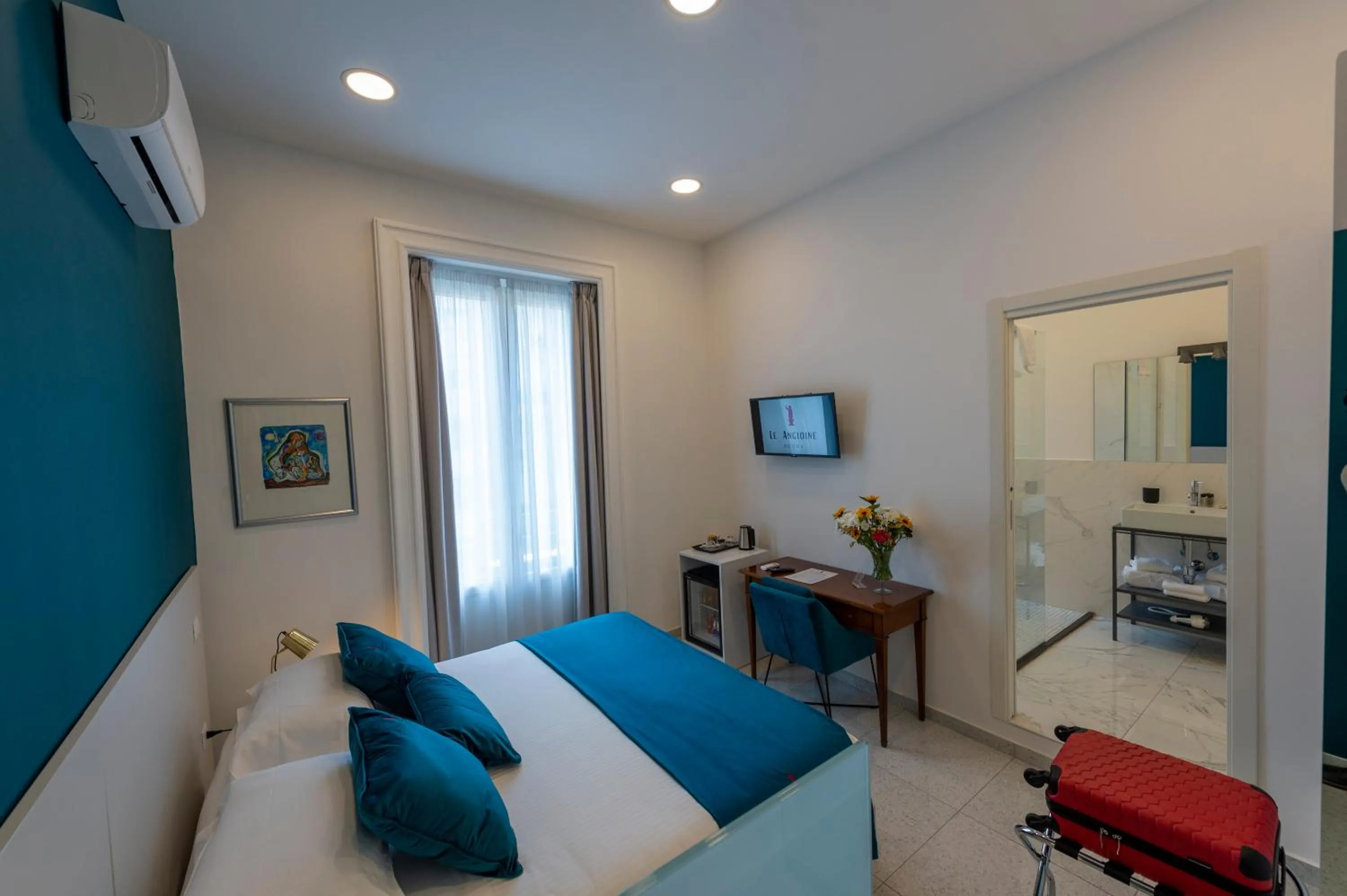 Bed in Le Angioine Rooms