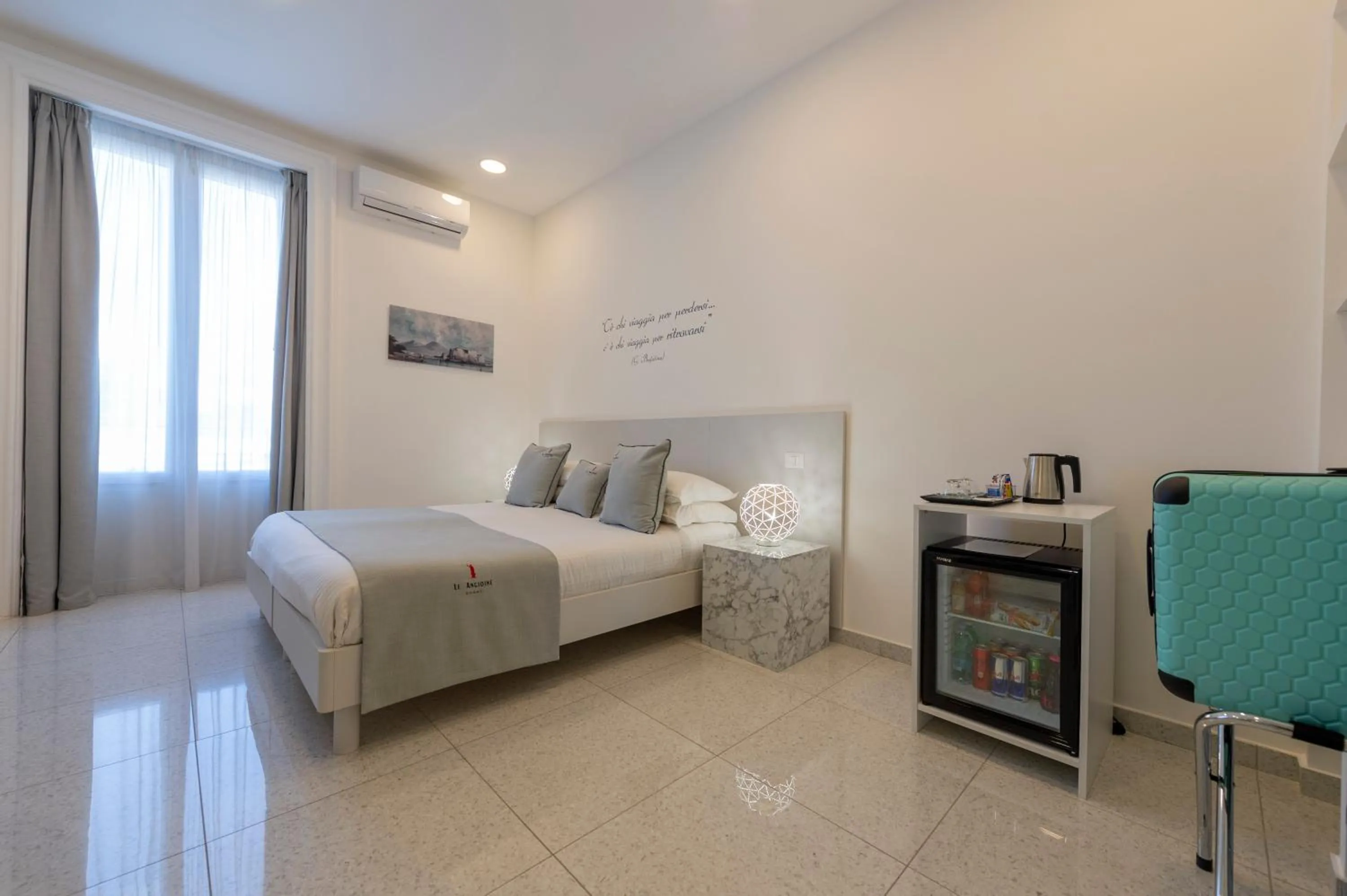 Bed in Le Angioine Rooms