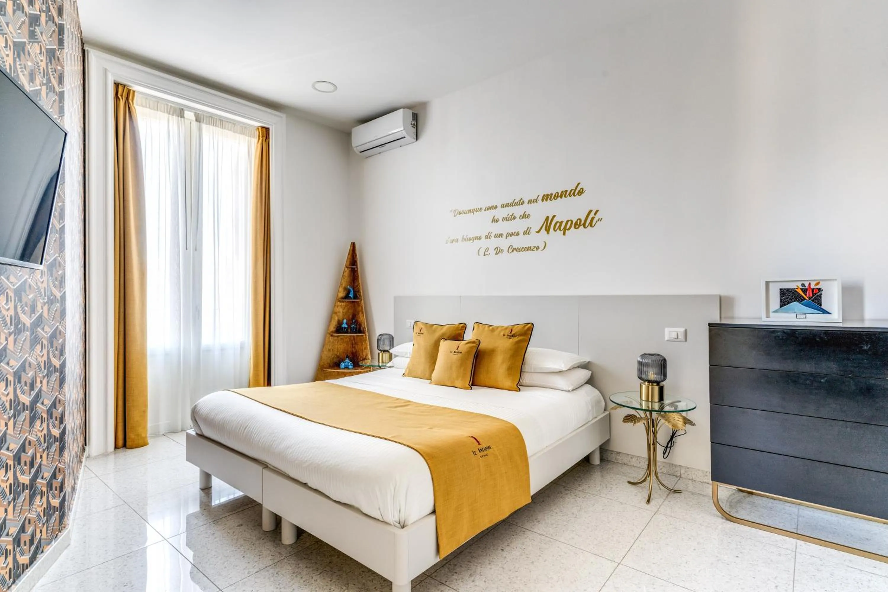 Bed in Le Angioine Rooms