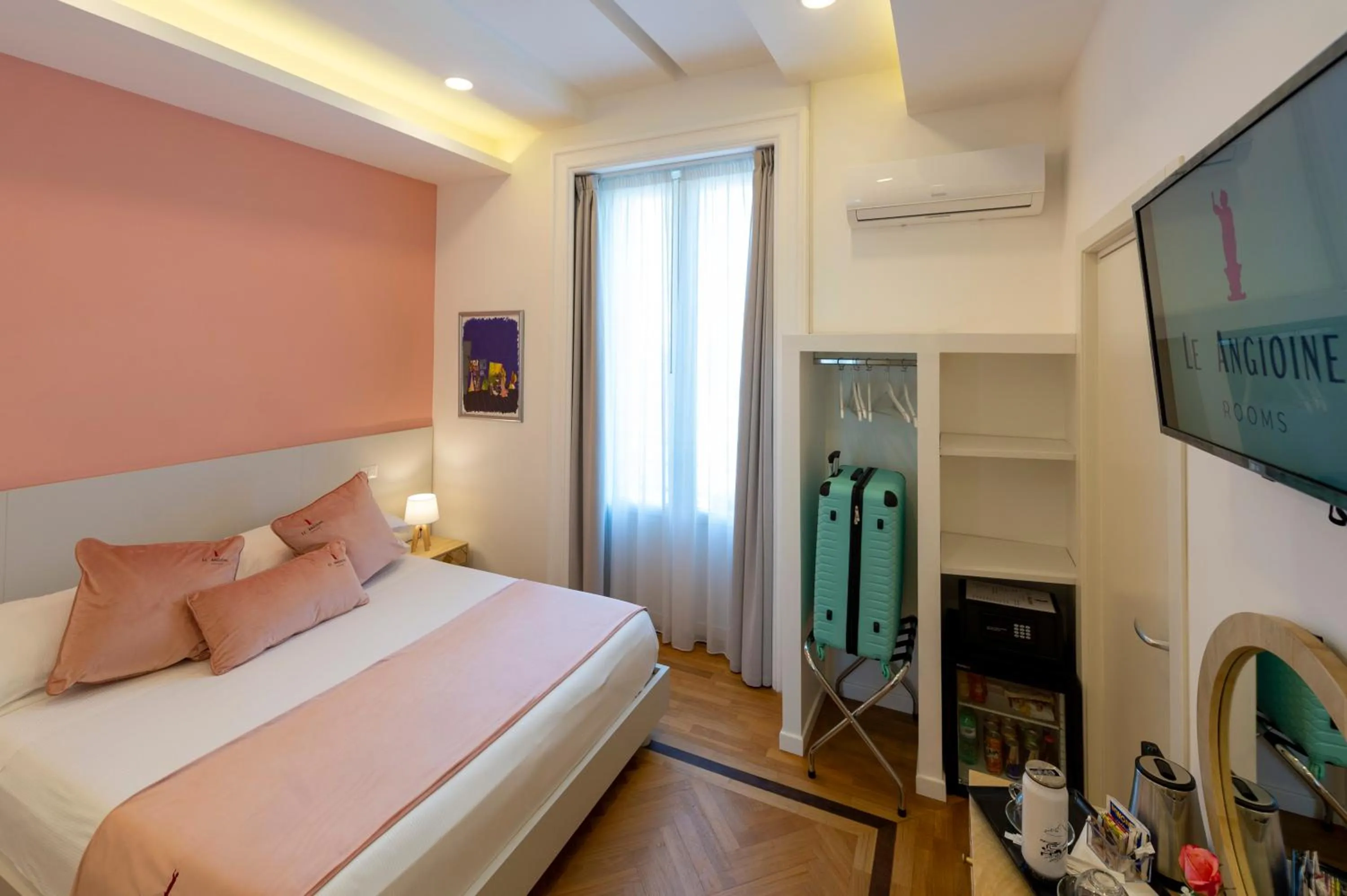 Bed in Le Angioine Rooms