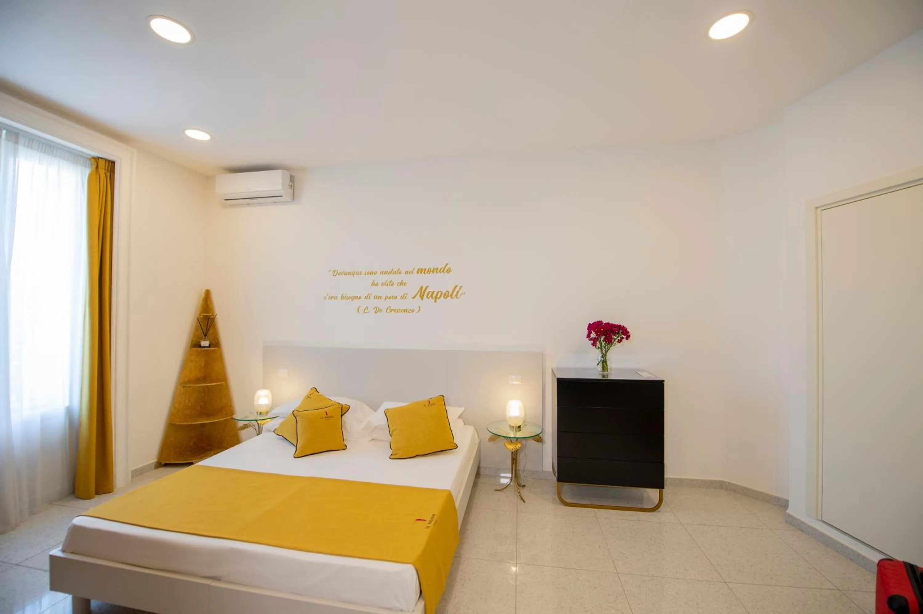 Bed in Le Angioine Rooms