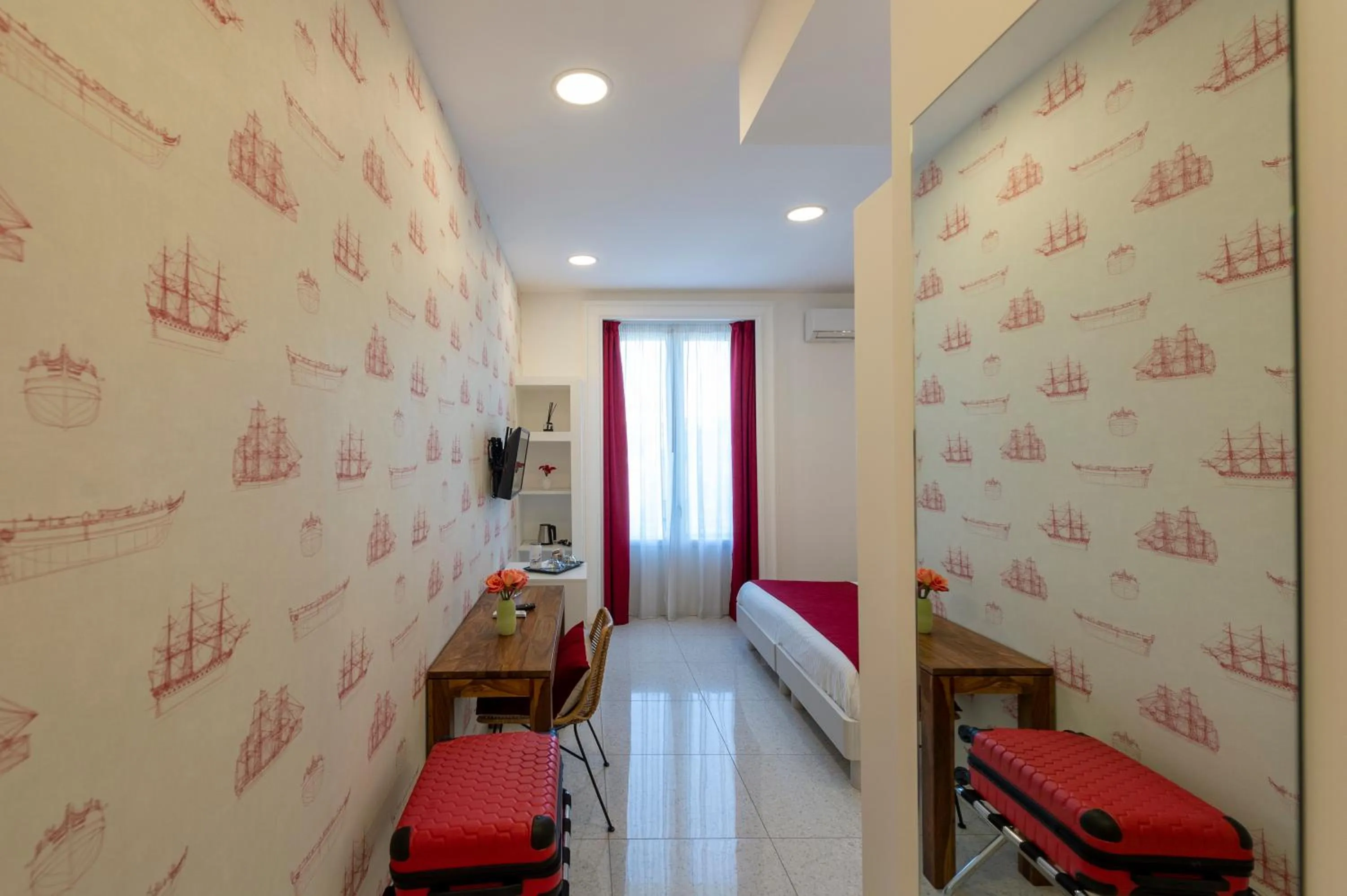 Bed in Le Angioine Rooms