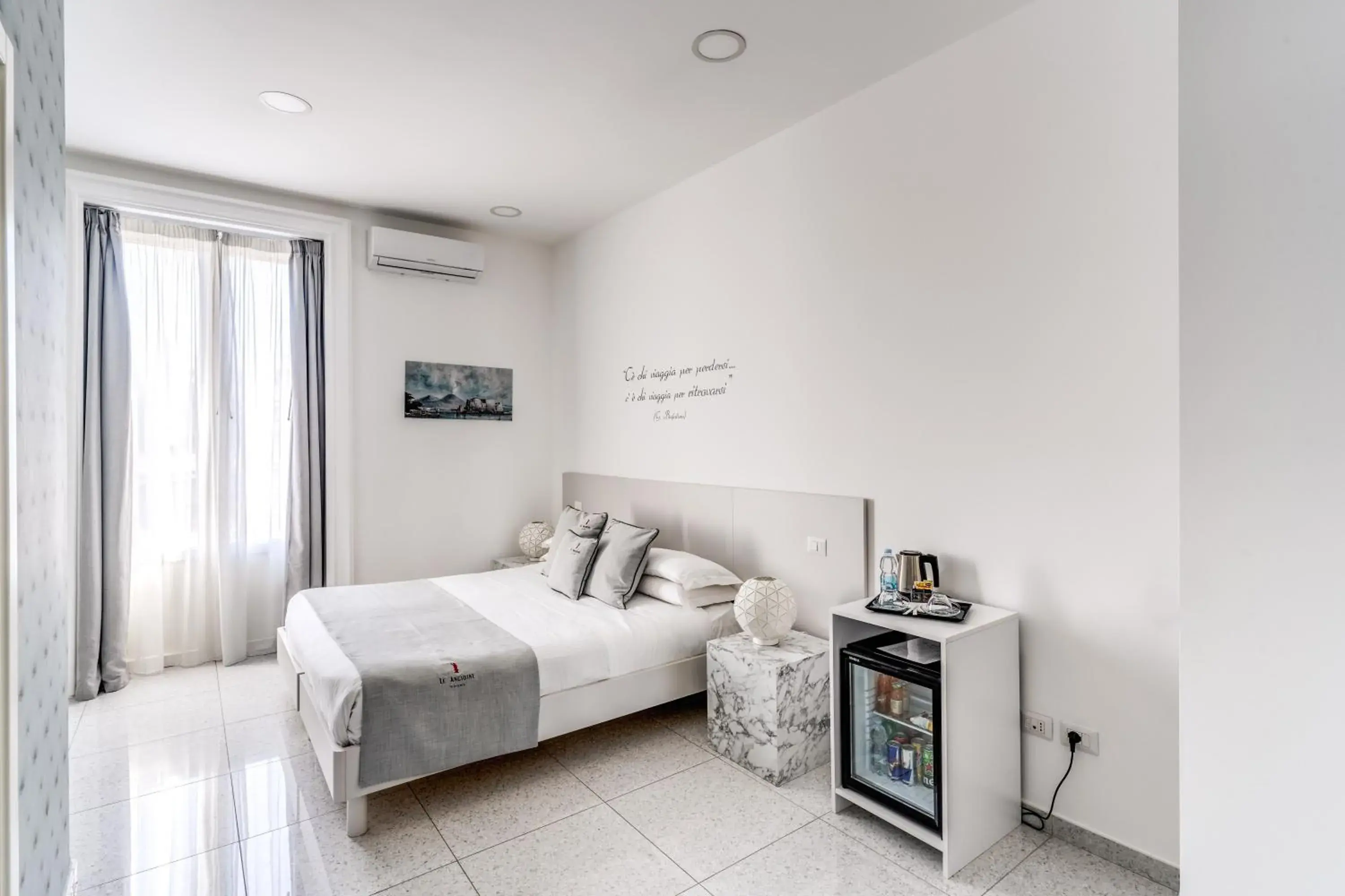 Superior Quadruple Room in Le Angioine Rooms Superior Quadruple Room in Le Angioine Rooms