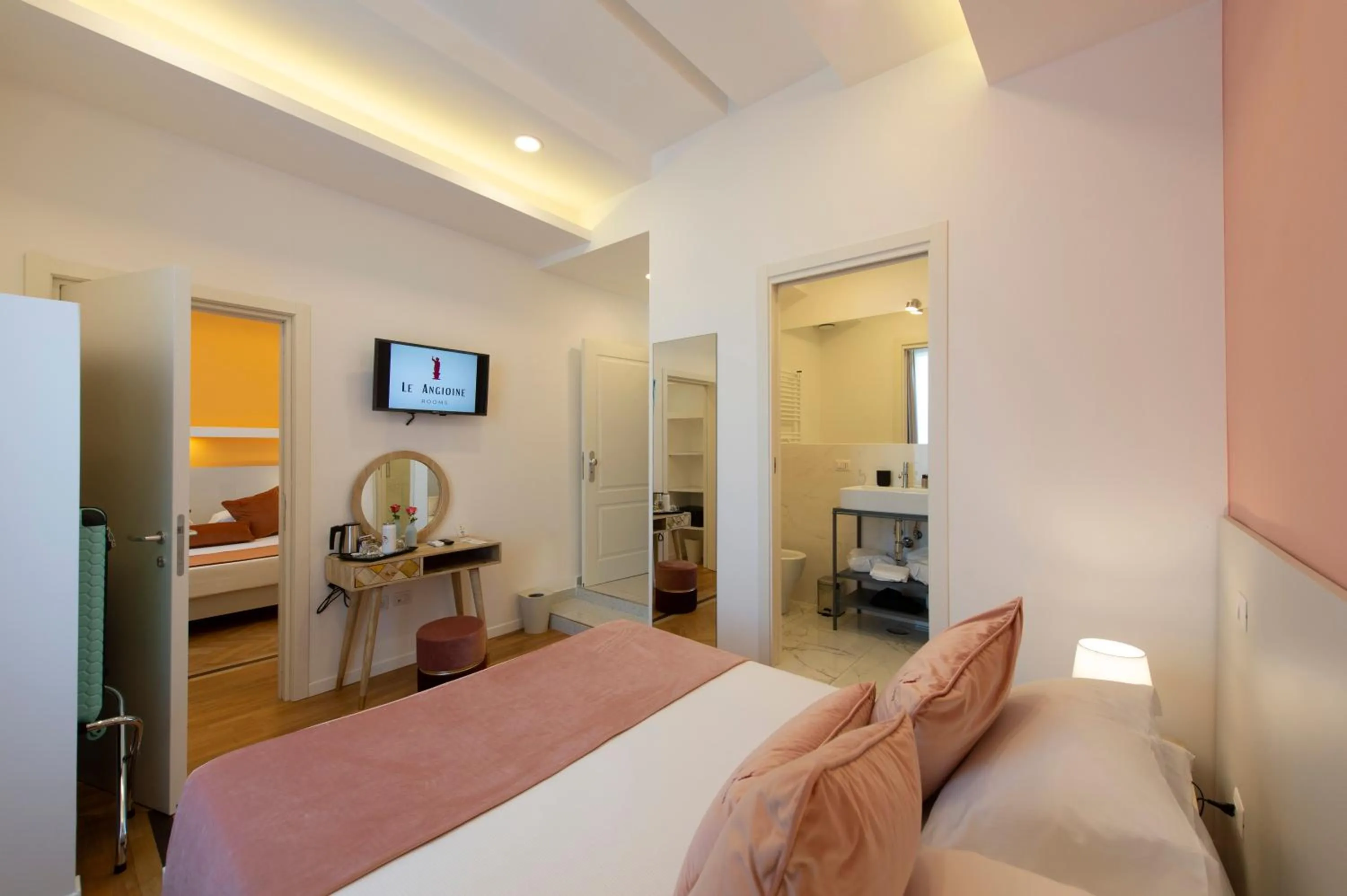 Bed in Le Angioine Rooms