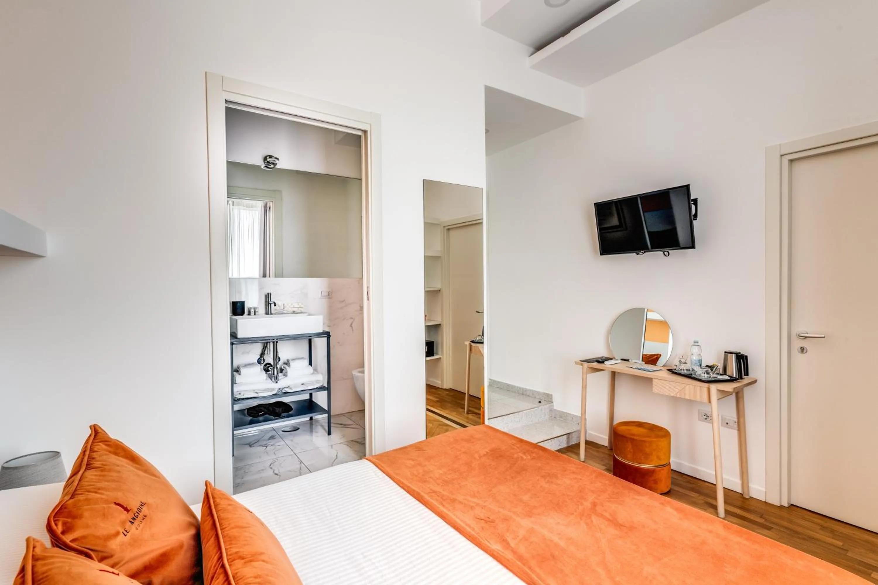 Bed in Le Angioine Rooms