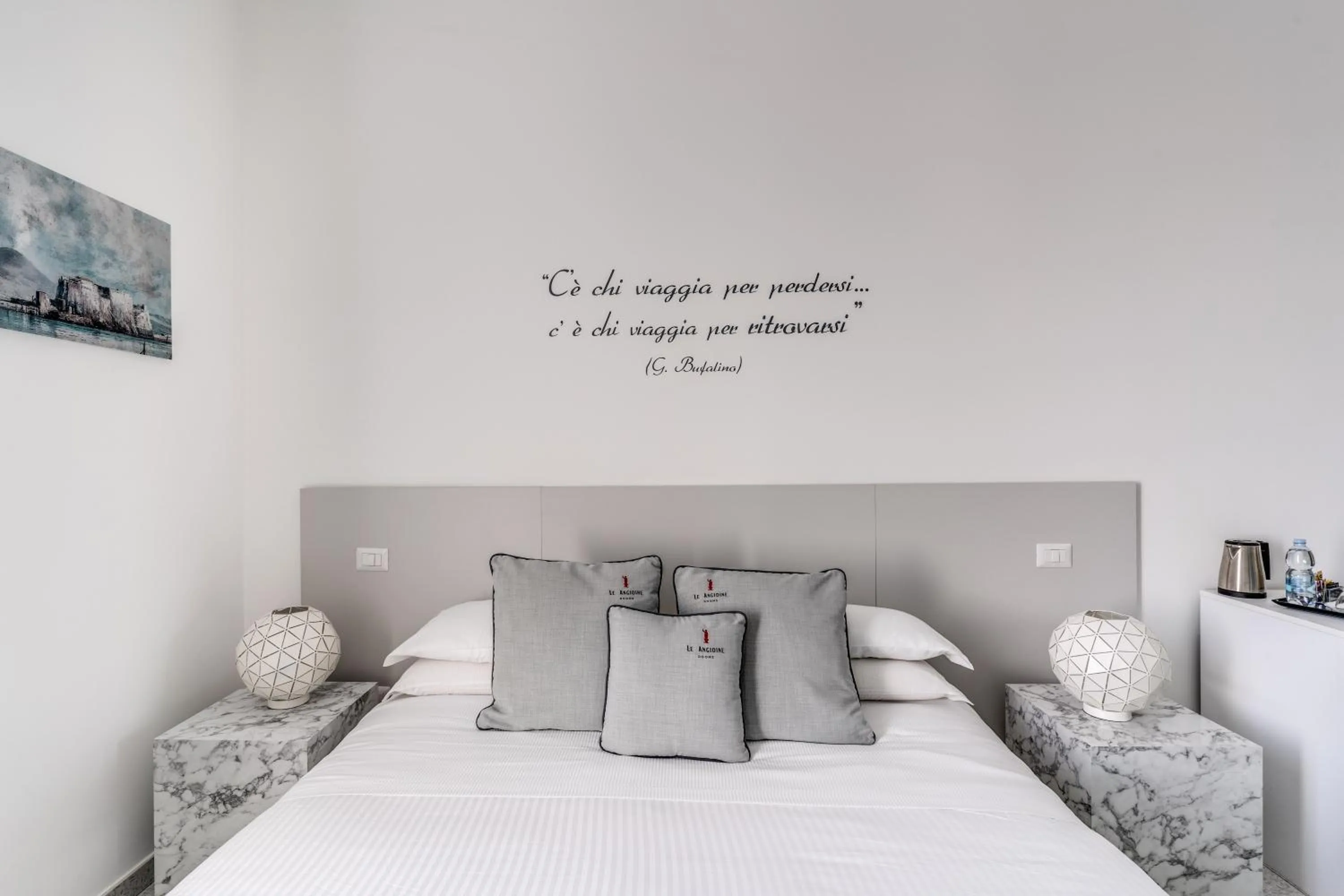 Bed in Le Angioine Rooms