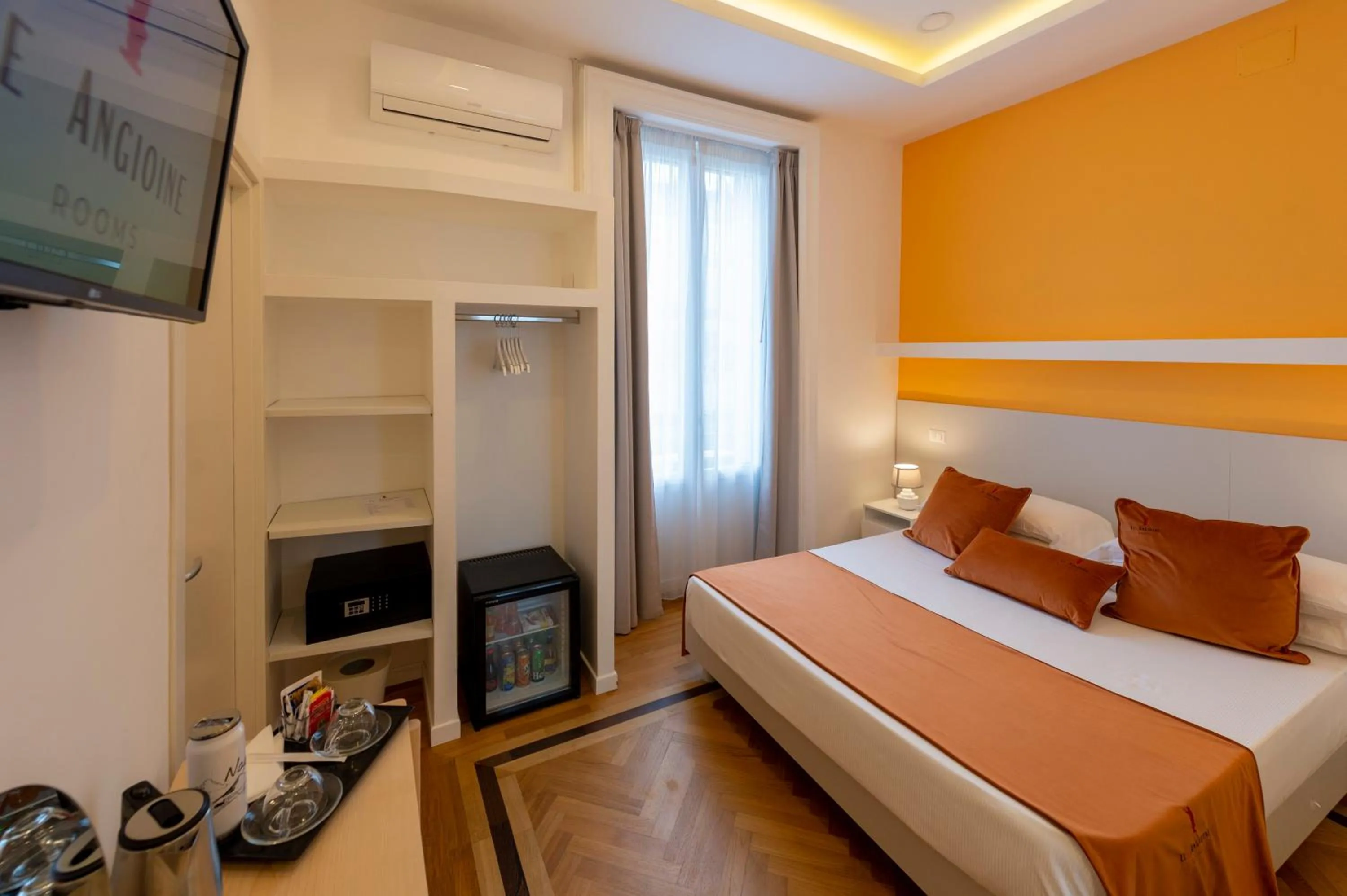 Bed in Le Angioine Rooms