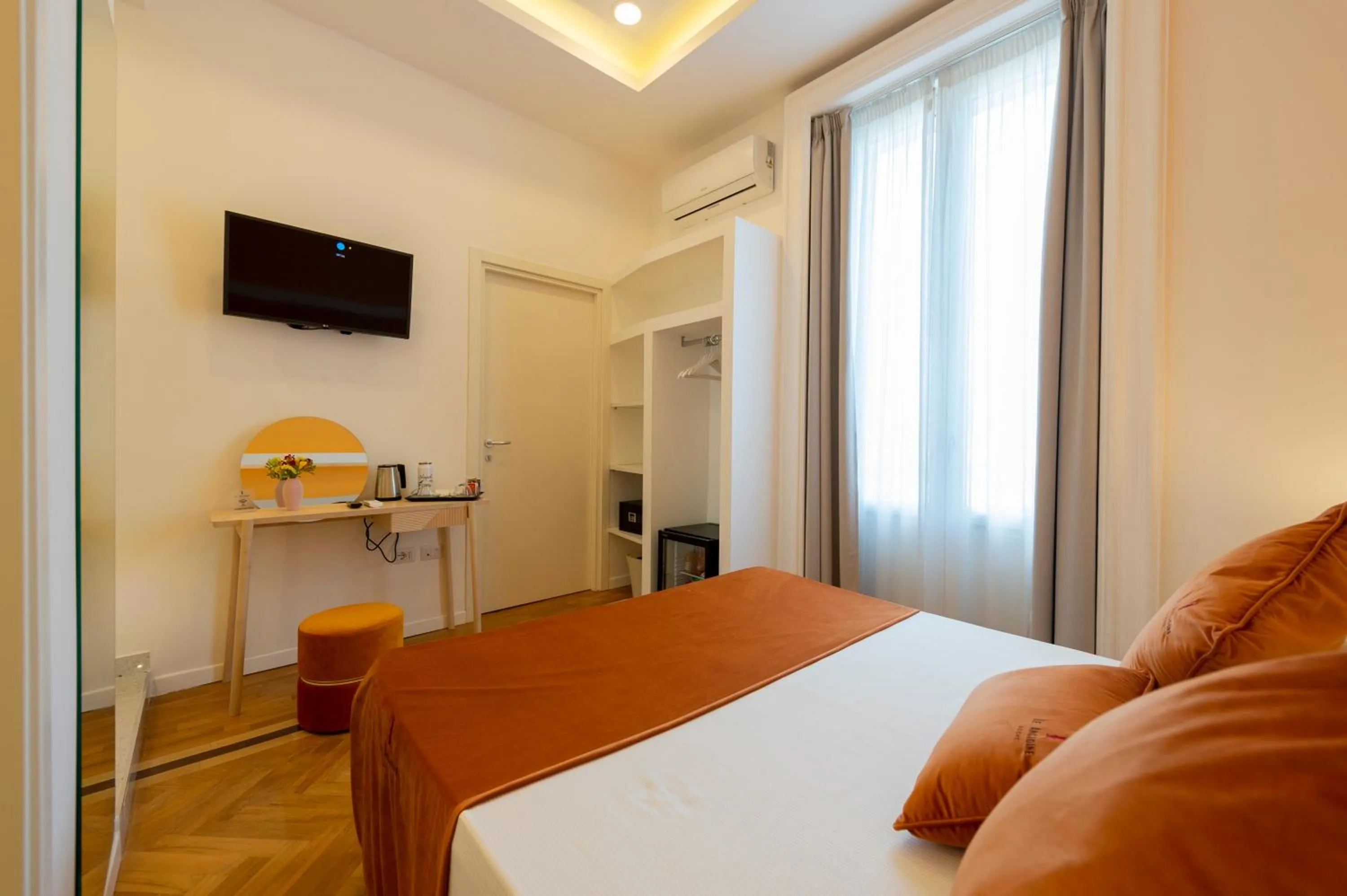 Bed in Le Angioine Rooms