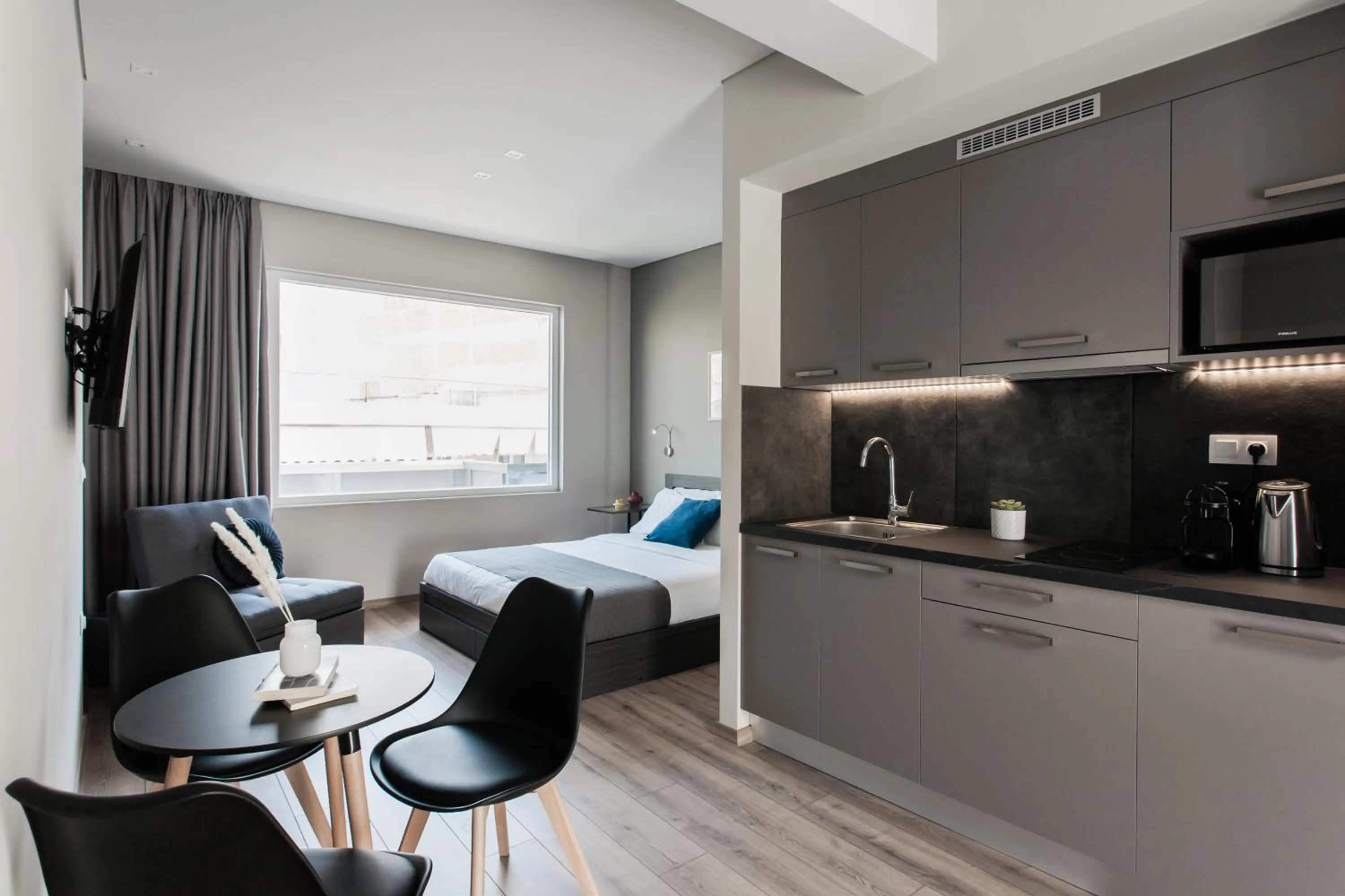 Bed in WYZ Athens Apartments by UPSTREET