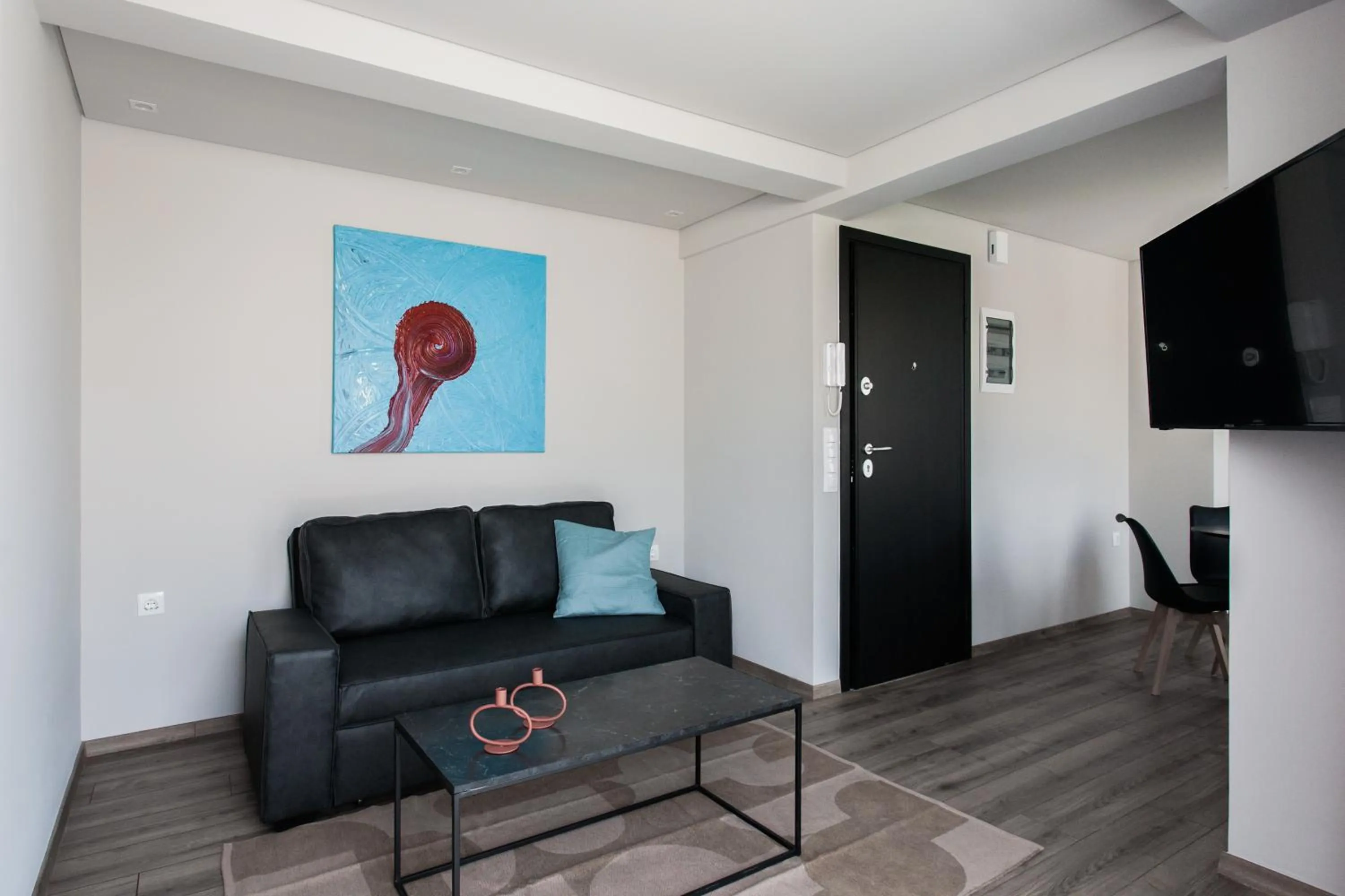 Living room in WYZ Athens Apartments by UPSTREET