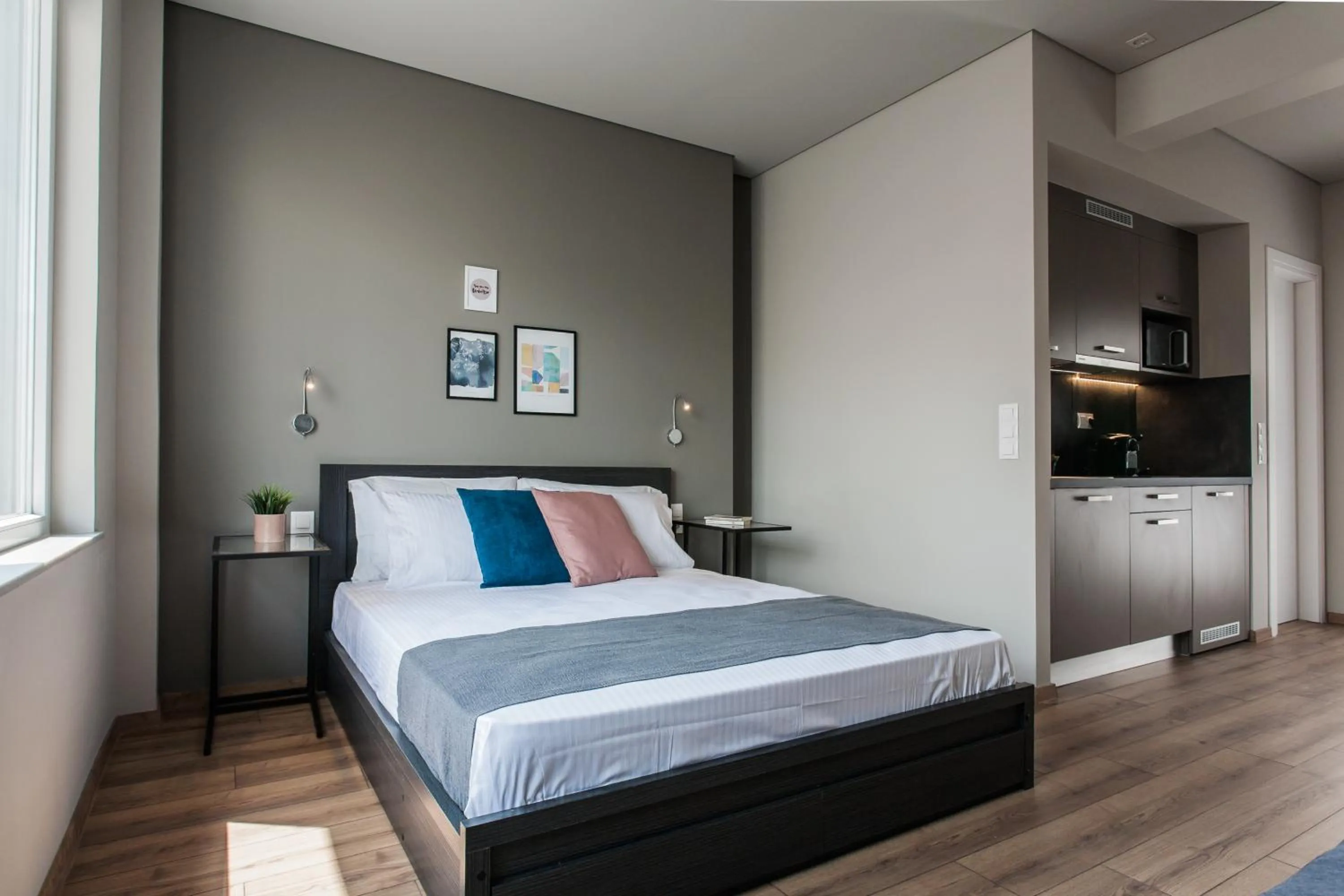 Bed in WYZ Athens Apartments by UPSTREET