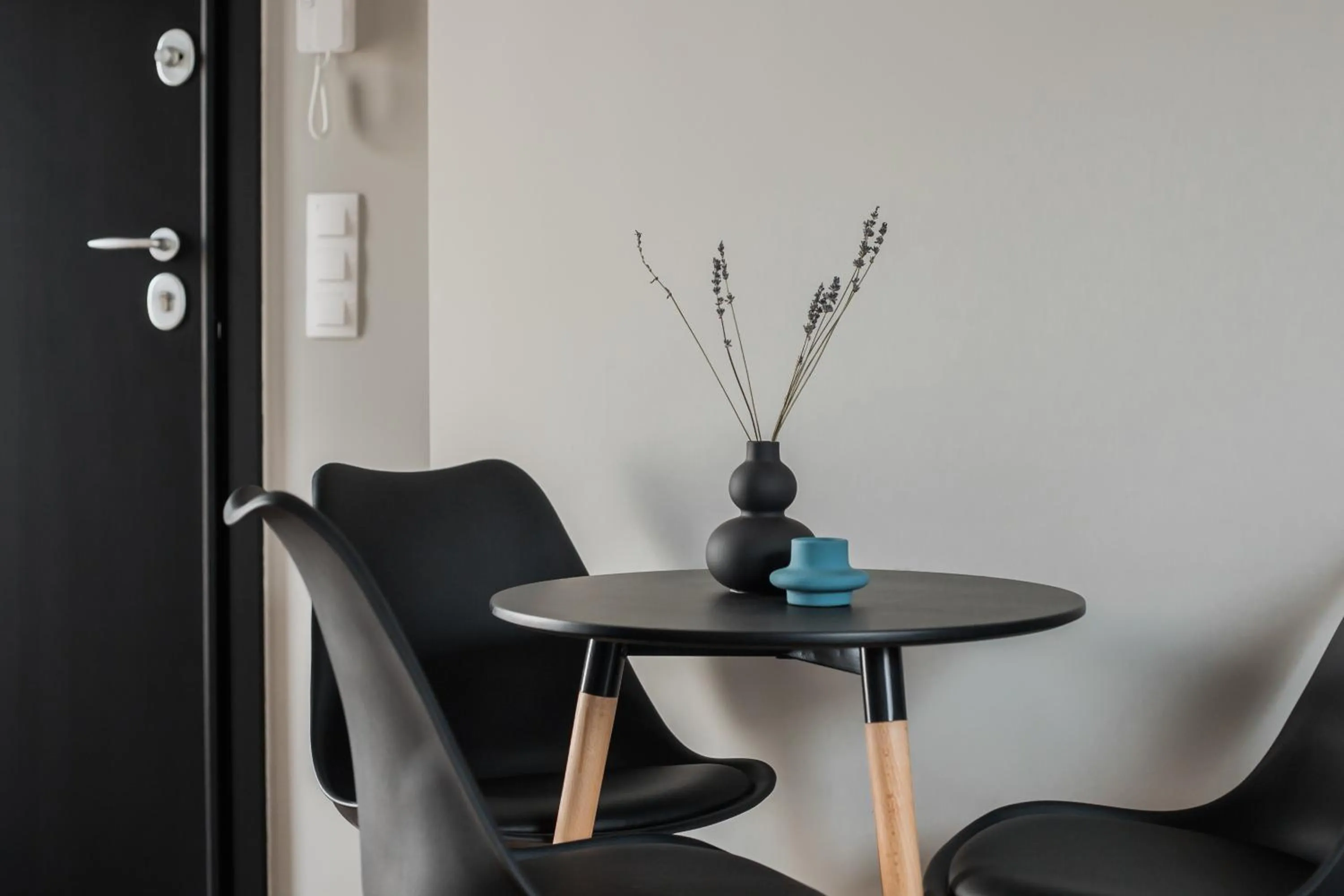 Dining area in WYZ Athens Apartments by UPSTREET