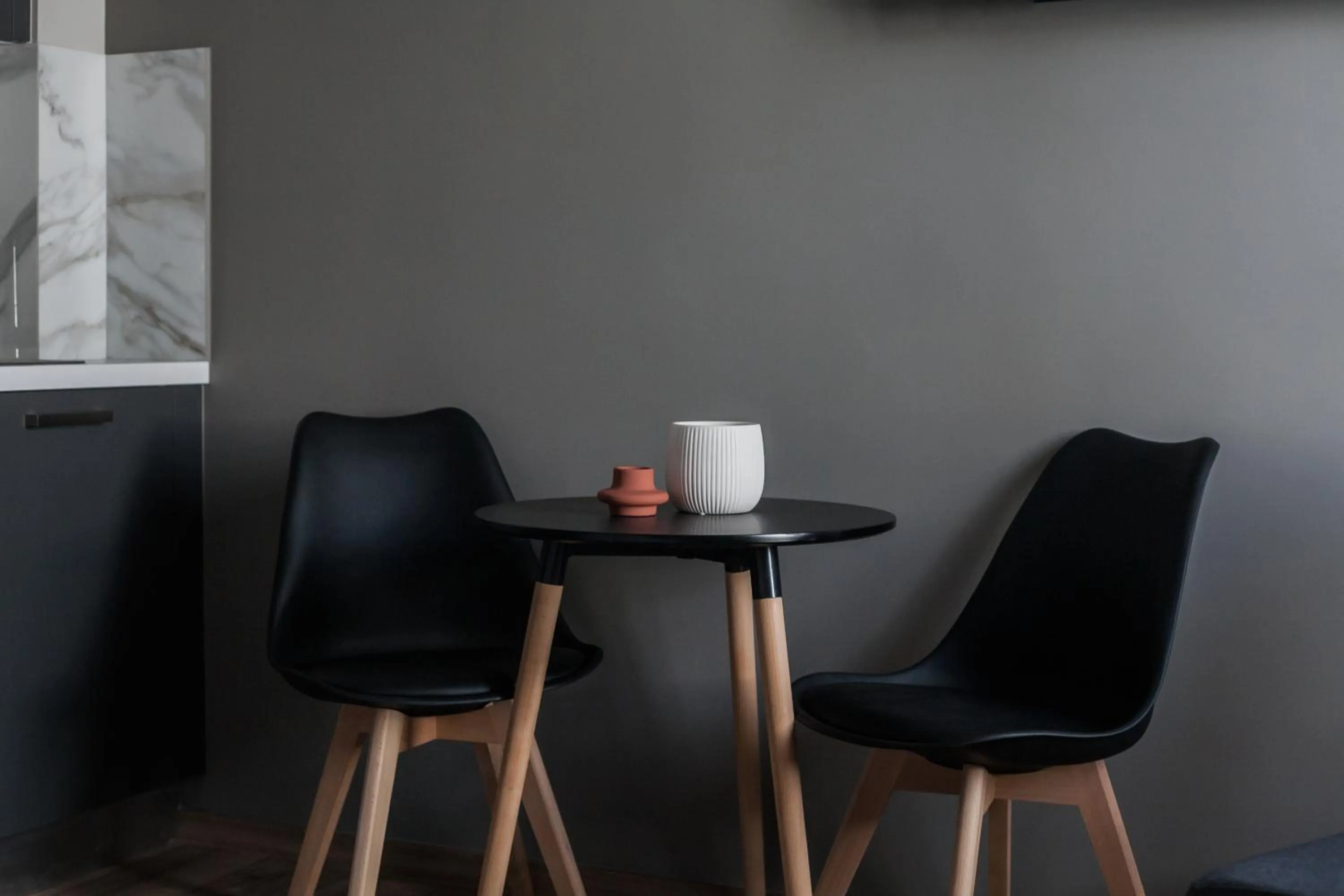 Seating area in WYZ Athens Apartments by UPSTREET