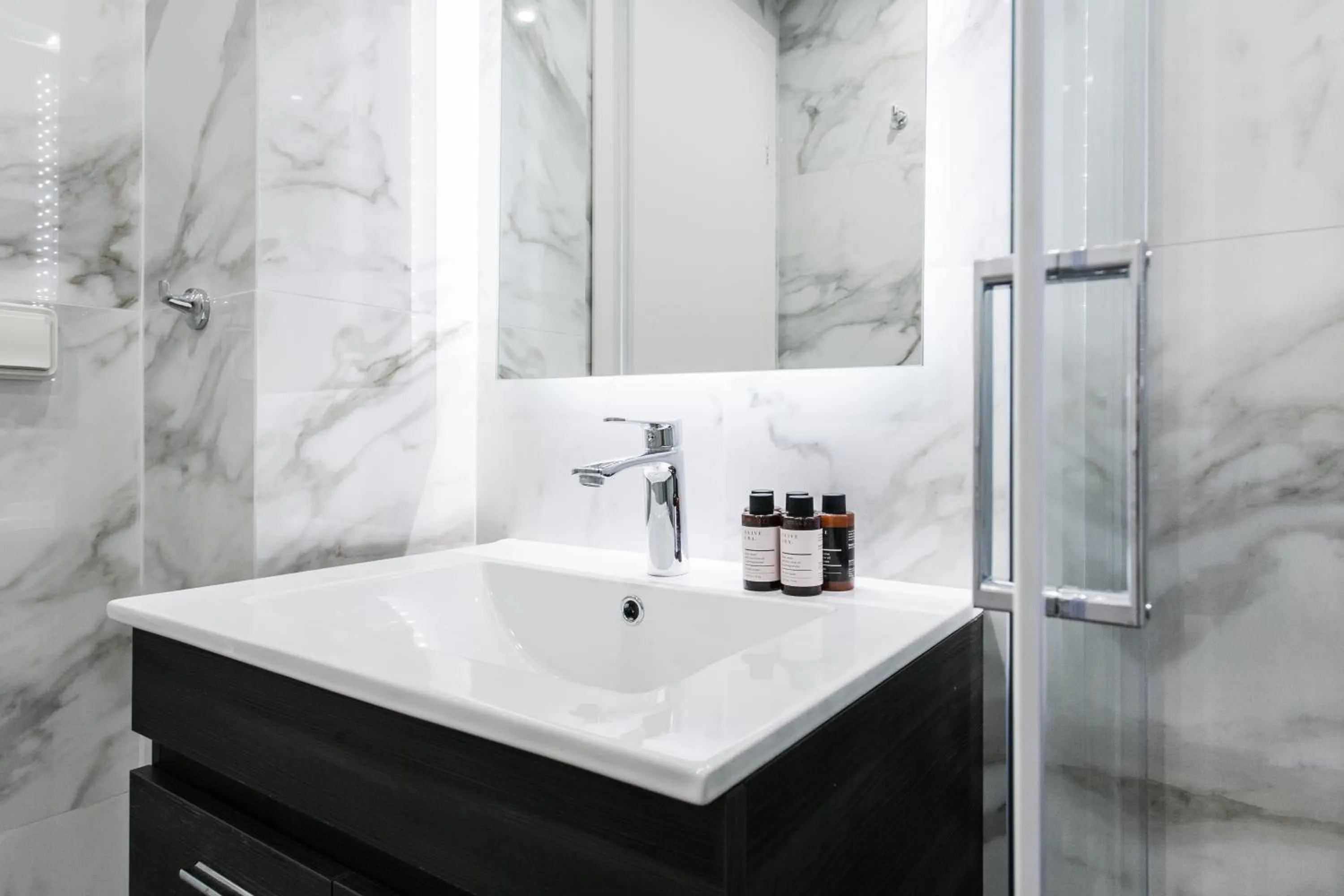 Shower in WYZ Athens Apartments by UPSTREET