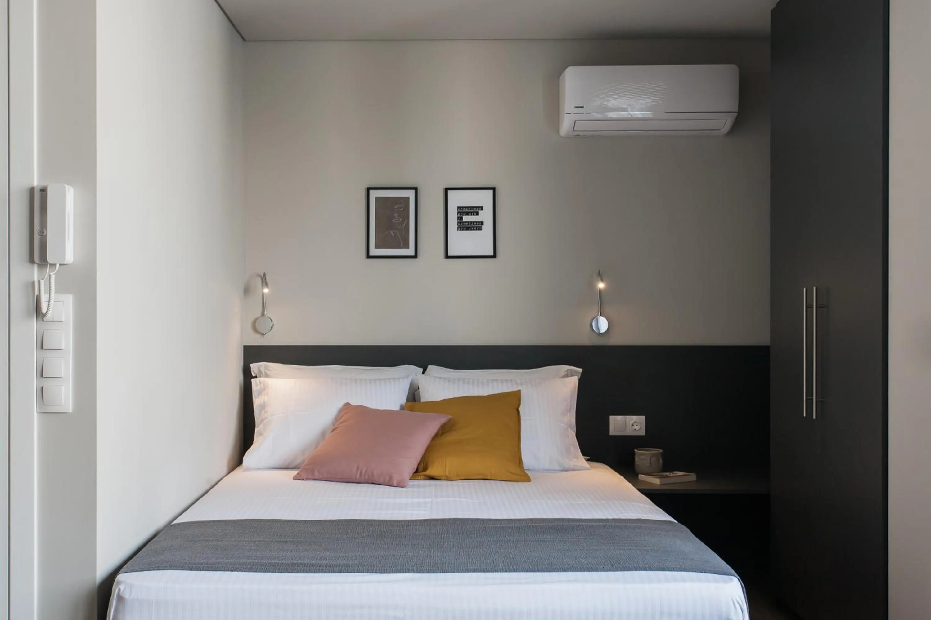 Bed in WYZ Athens Apartments by UPSTREET