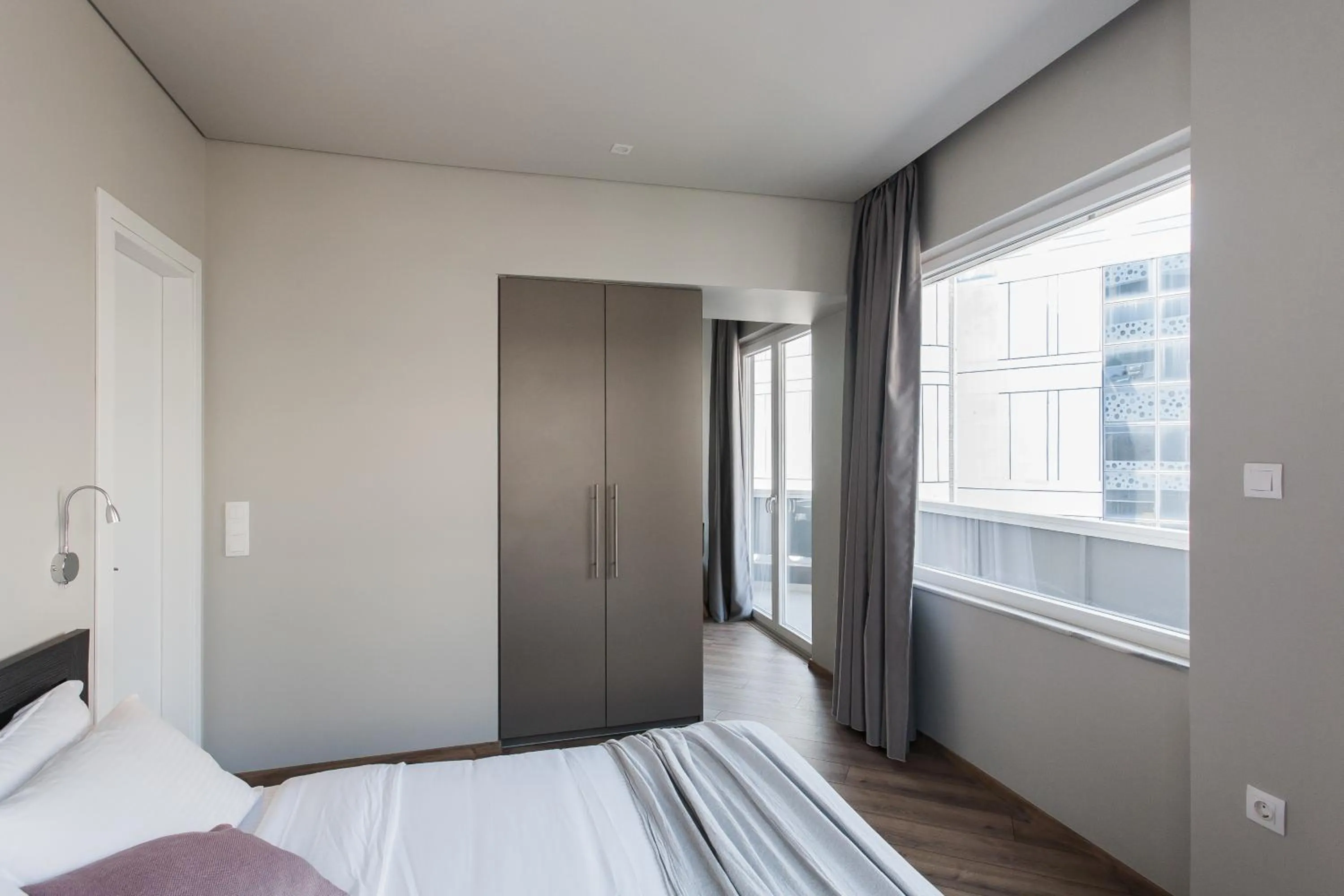Bedroom, Bed in WYZ Athens Apartments by UPSTREET