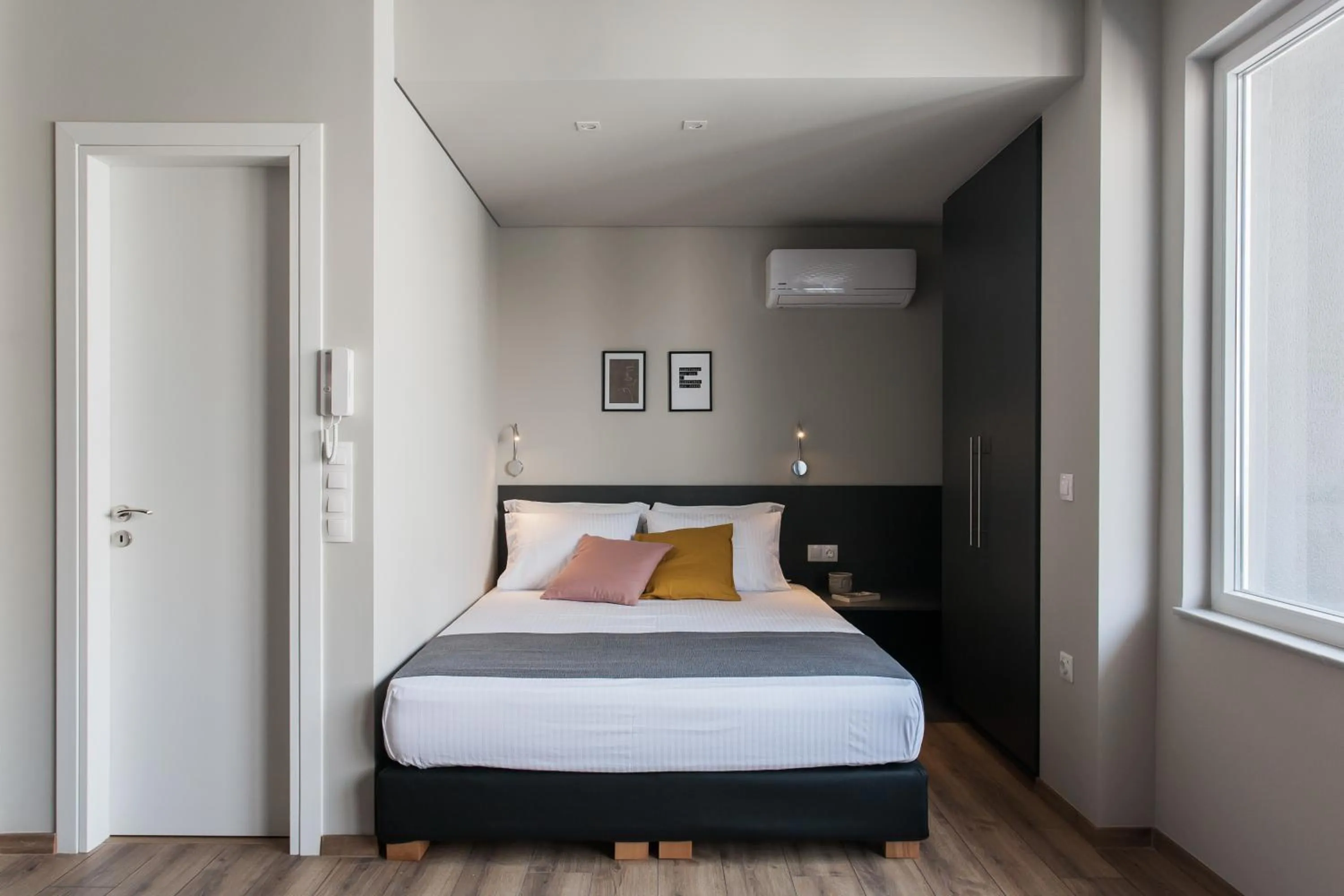 Bed in WYZ Athens Apartments by UPSTREET