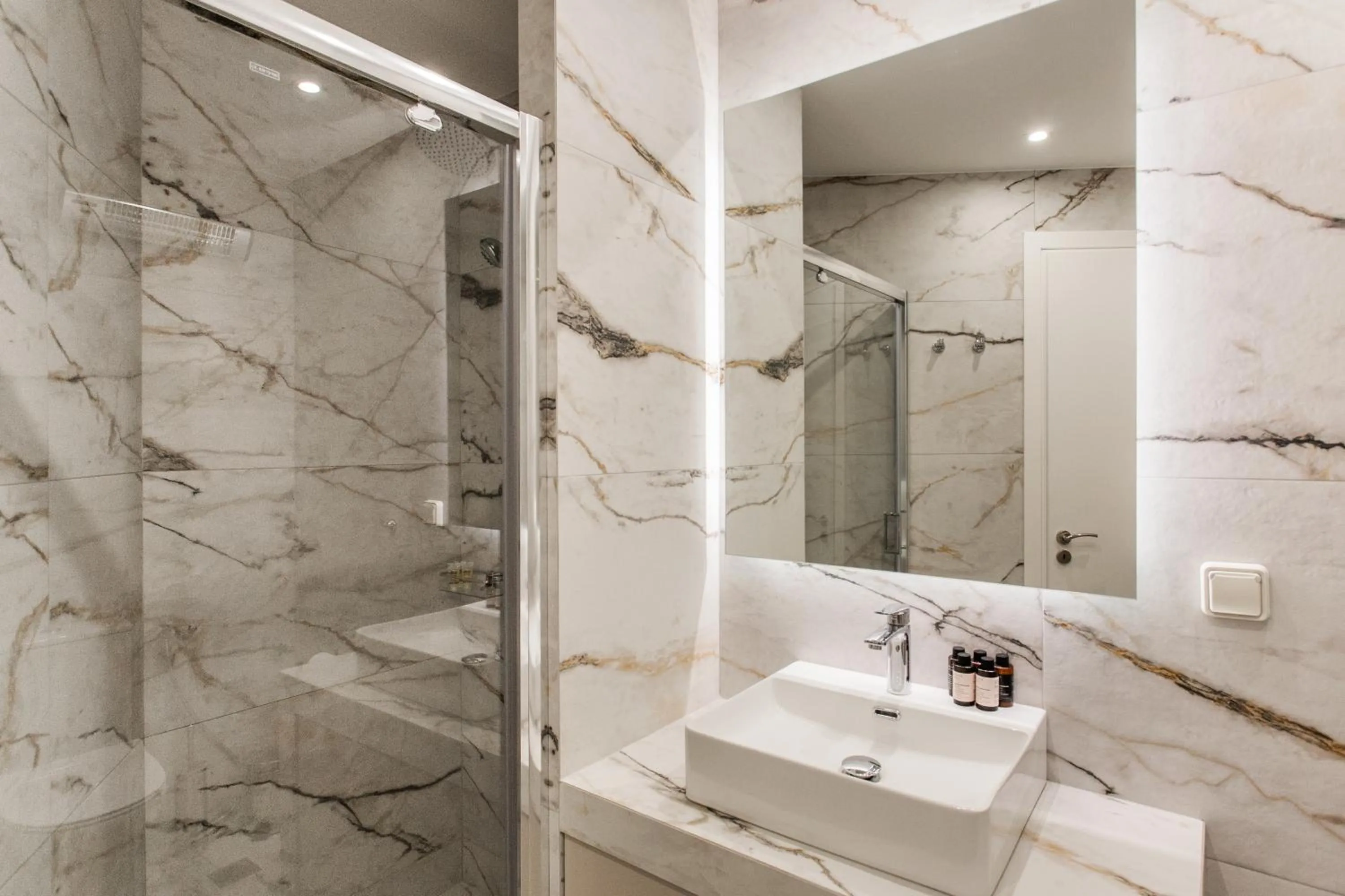 Shower in WYZ Athens Apartments by UPSTREET