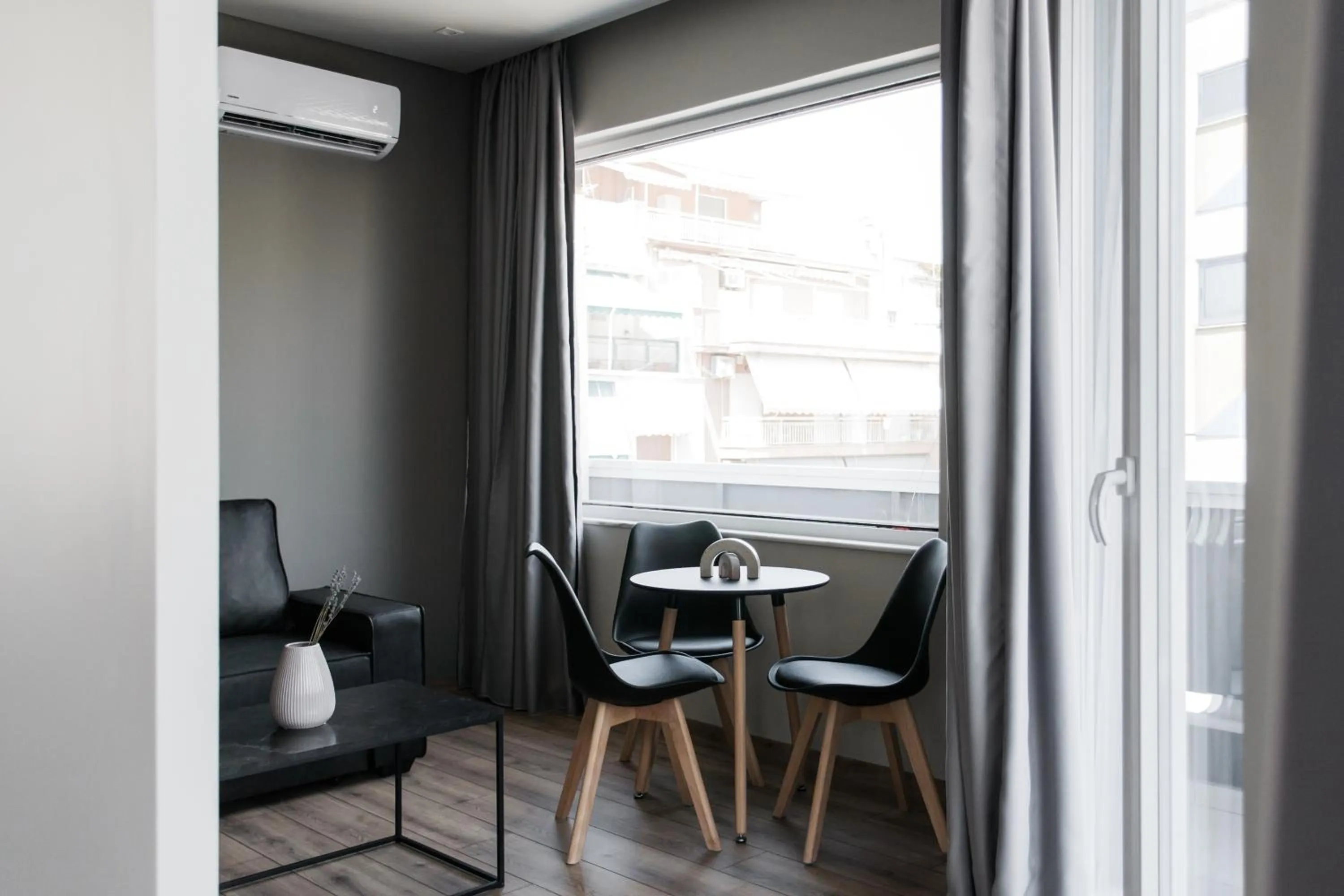 Living room in WYZ Athens Apartments by UPSTREET