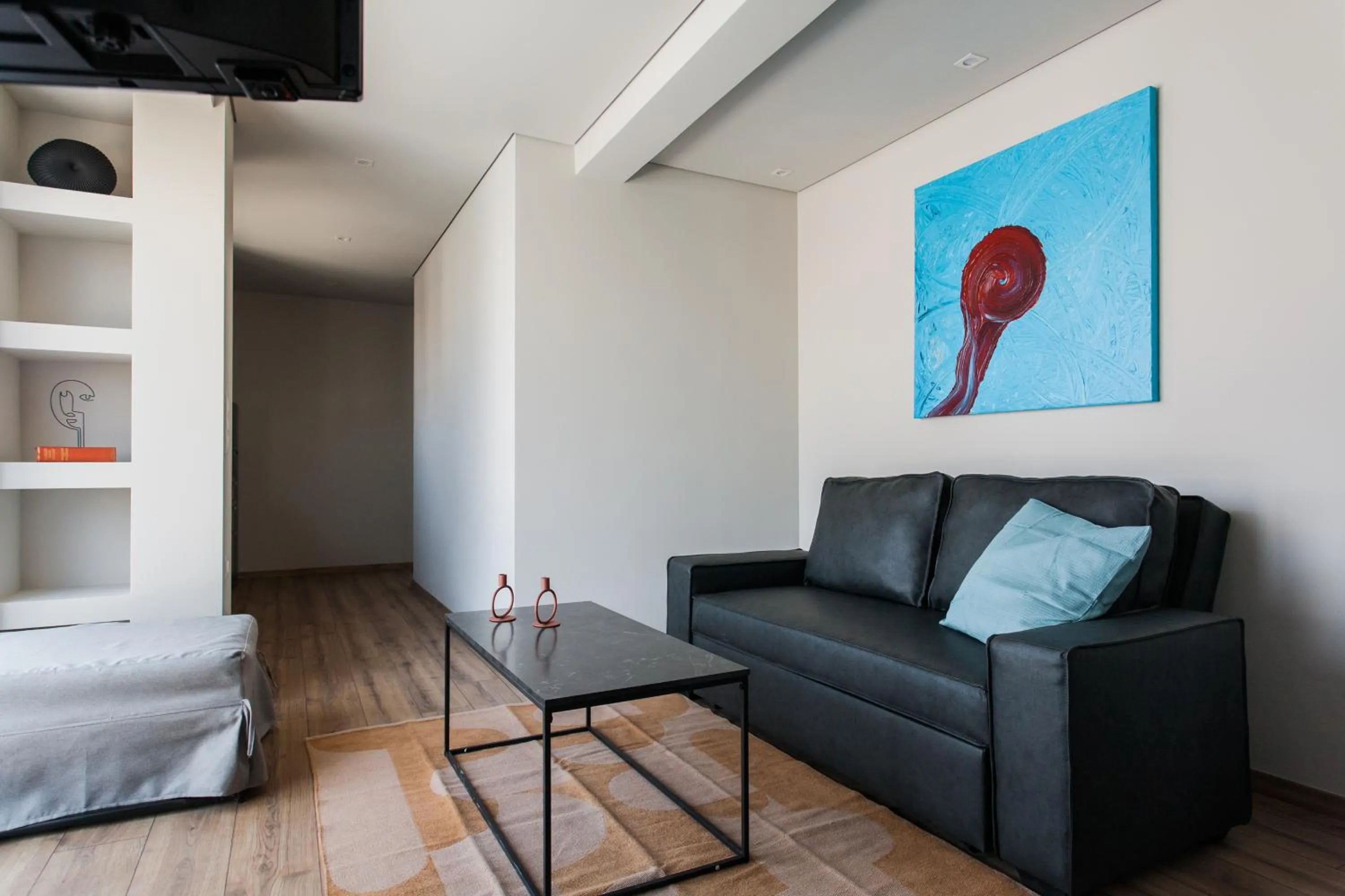 Living room, Bed in WYZ Athens Apartments by UPSTREET