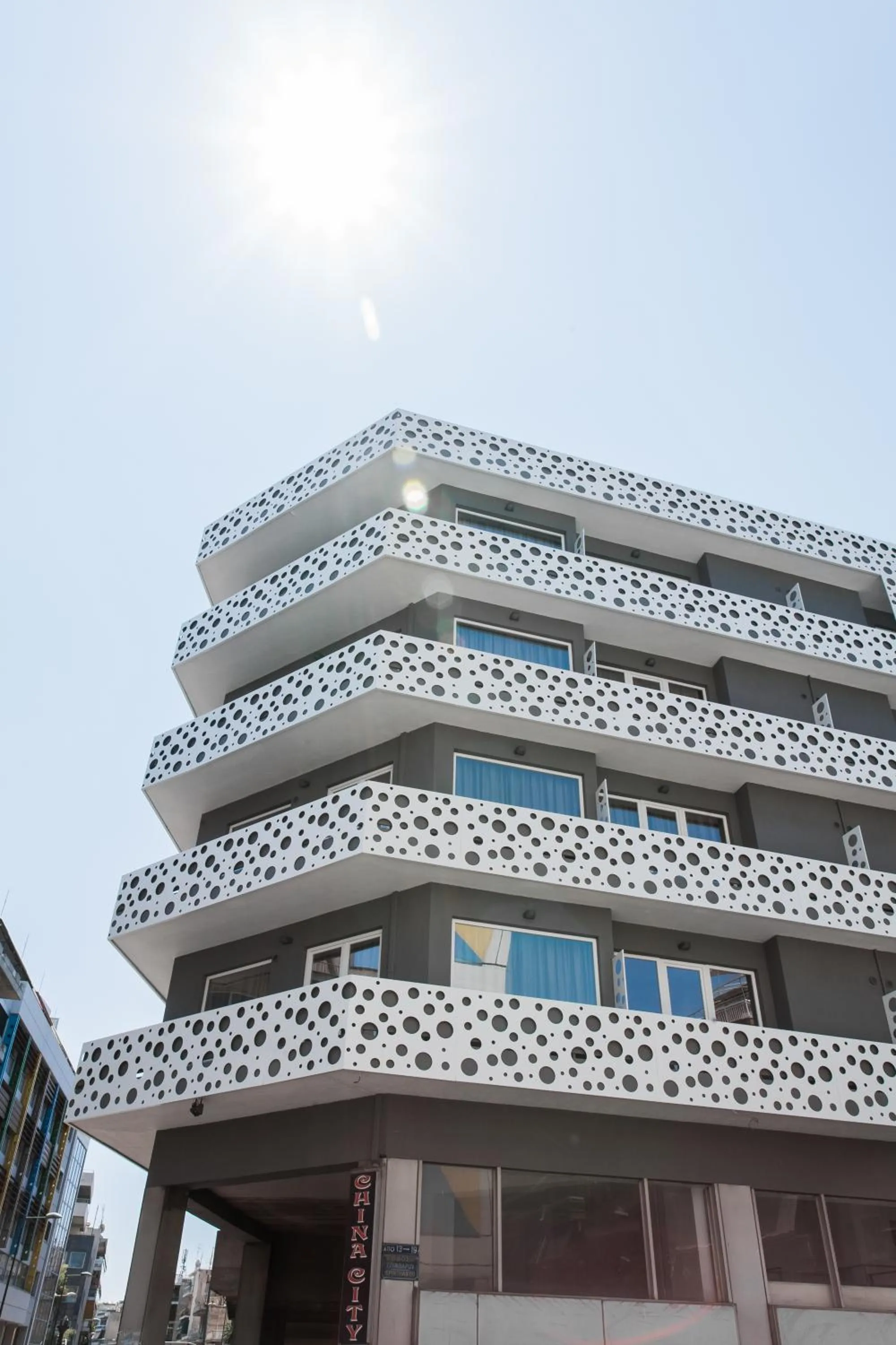 Property building in WYZ Athens Apartments by UPSTREET