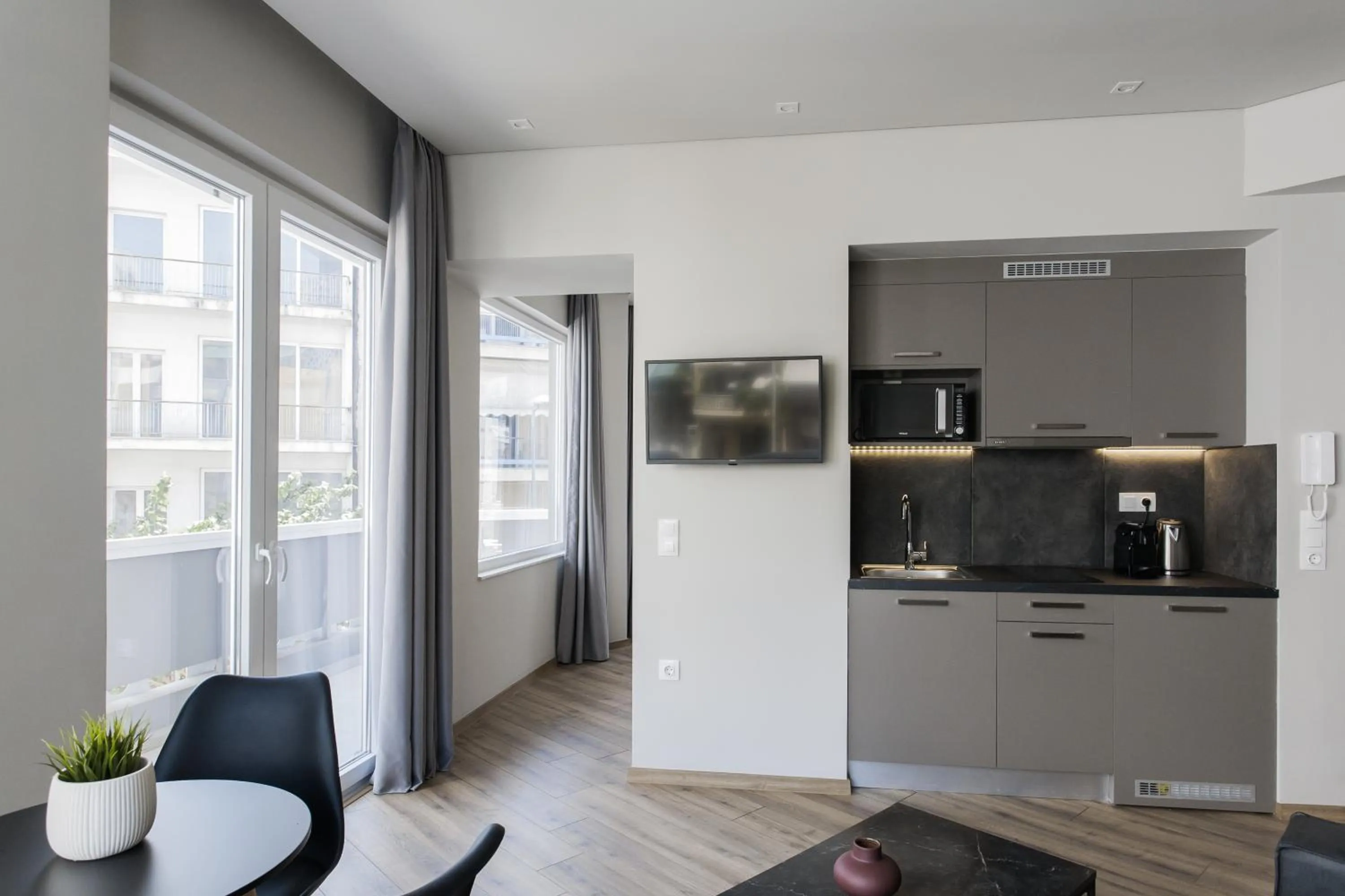 Library in WYZ Athens Apartments by UPSTREET