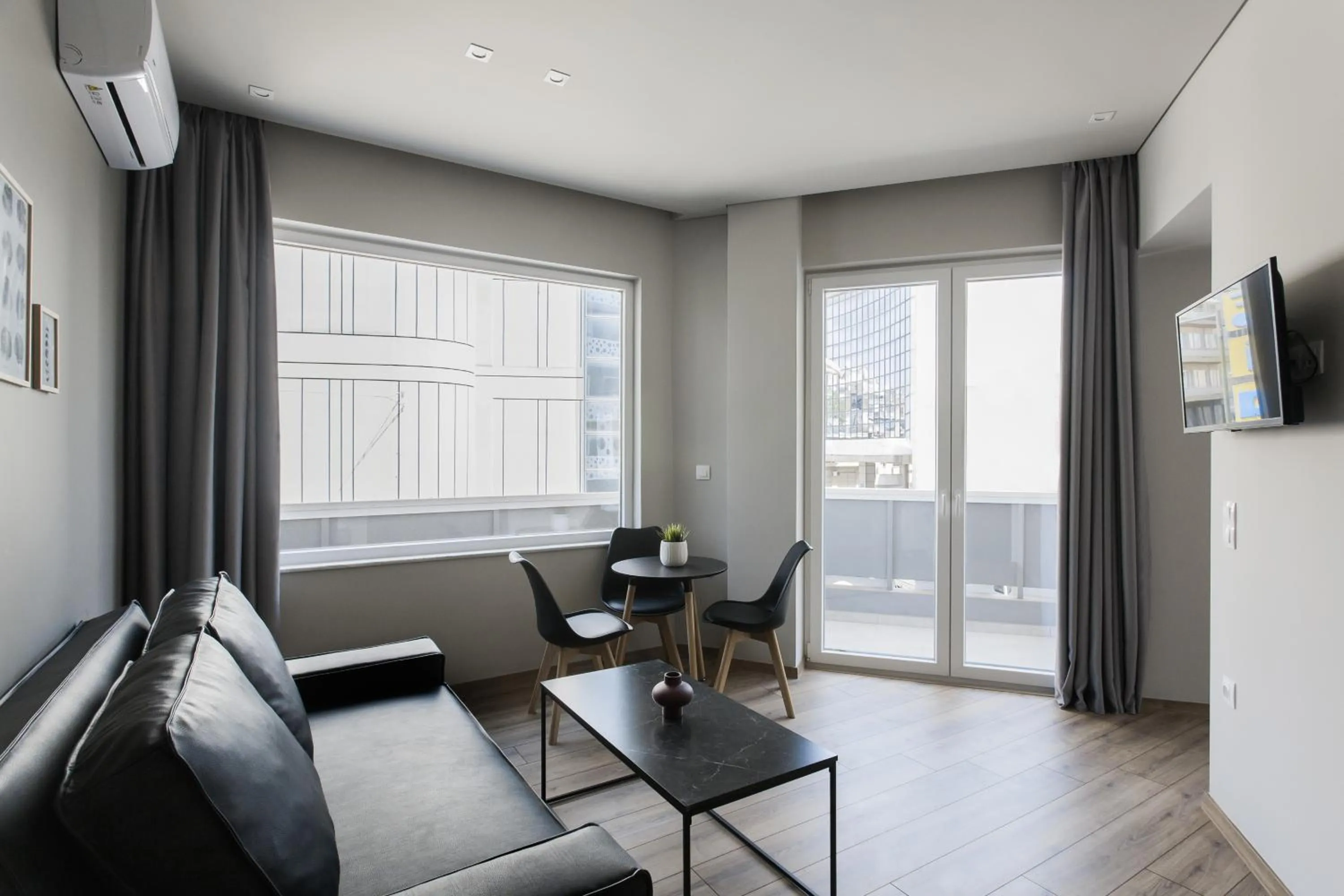 TV and multimedia in WYZ Athens Apartments by UPSTREET