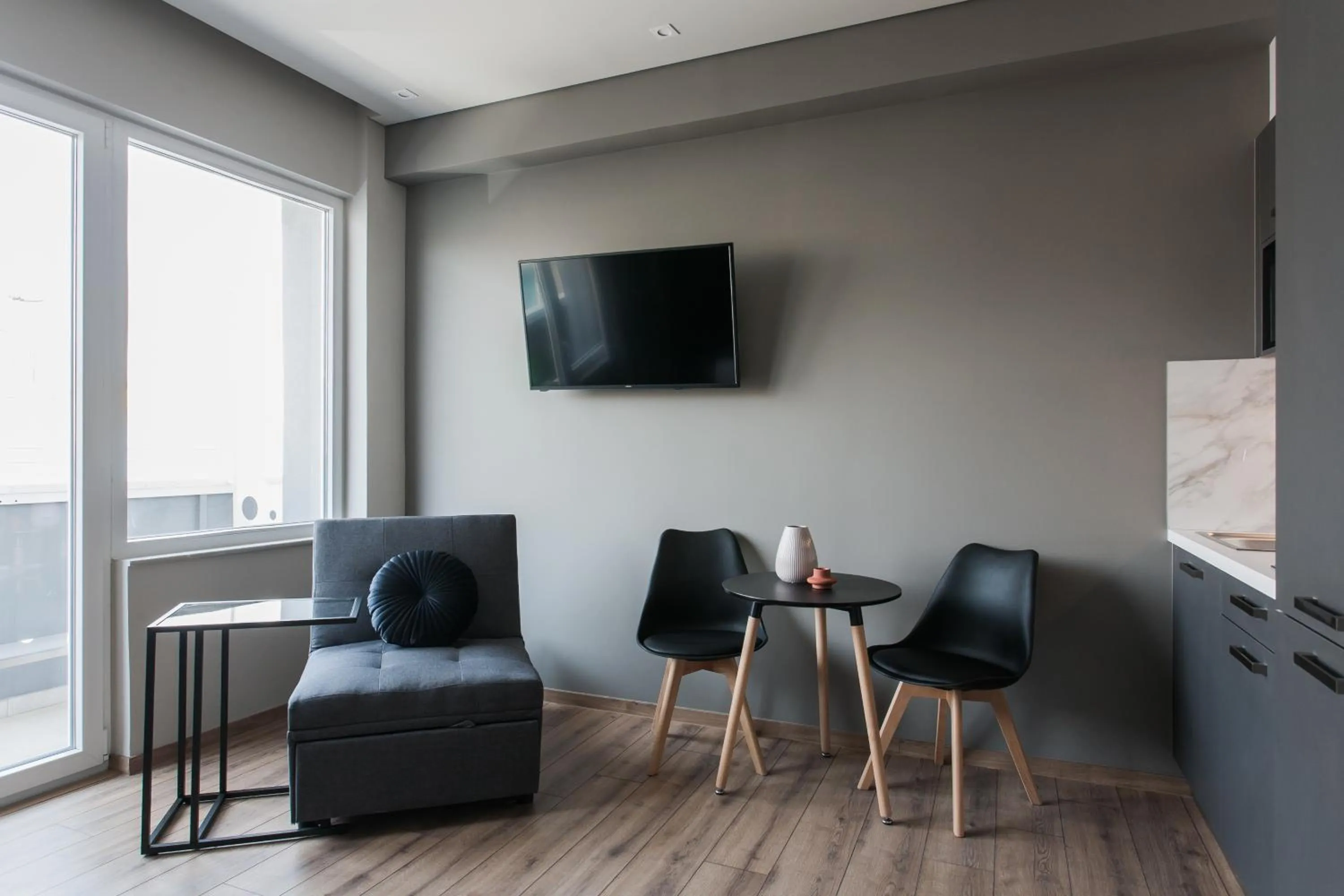 TV and multimedia in WYZ Athens Apartments by UPSTREET