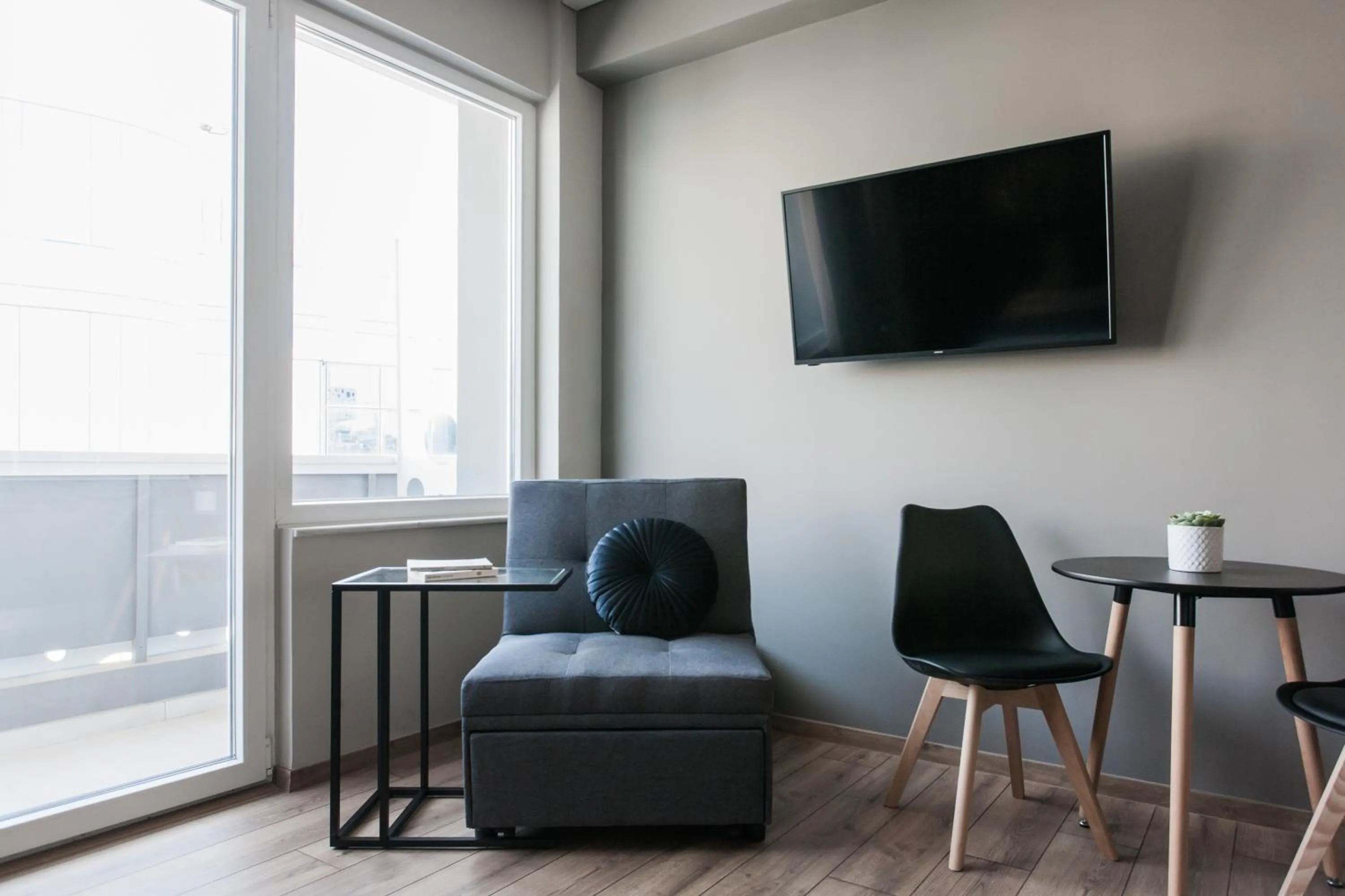 TV and multimedia in WYZ Athens Apartments by UPSTREET