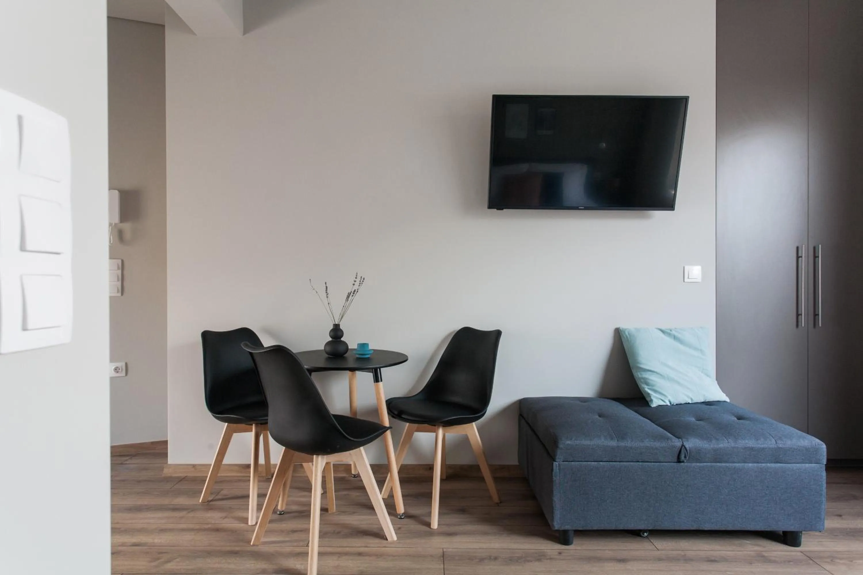 TV and multimedia in WYZ Athens Apartments by UPSTREET