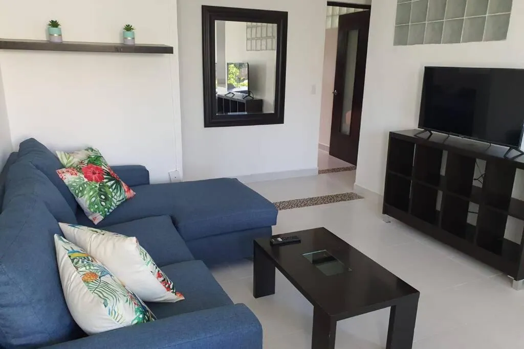 Communal lounge/ TV room in Depa de 3 habs, 3 baños y piscina (Zona Hotelera)