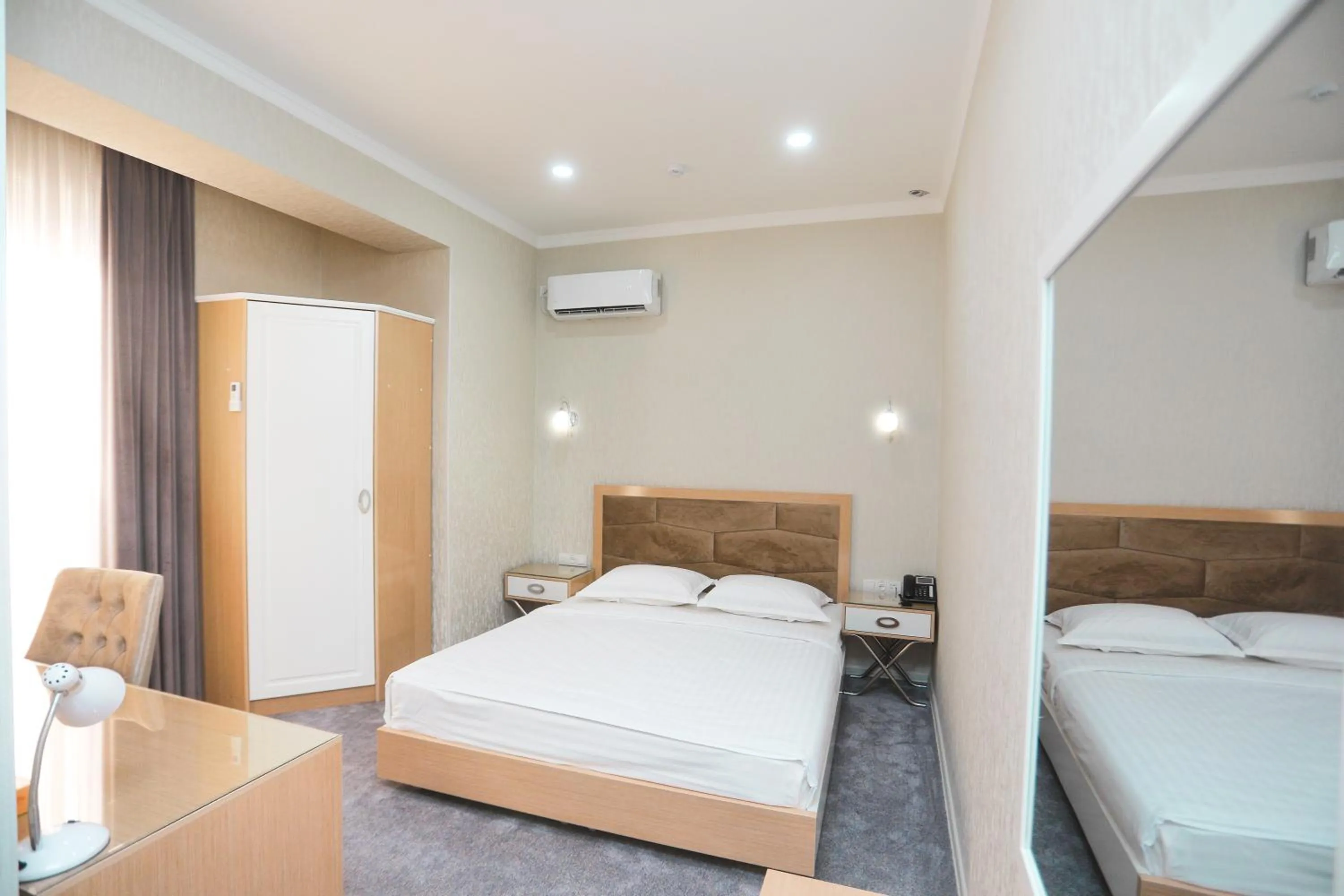 Bed in Reikartz Amirun Tashkent