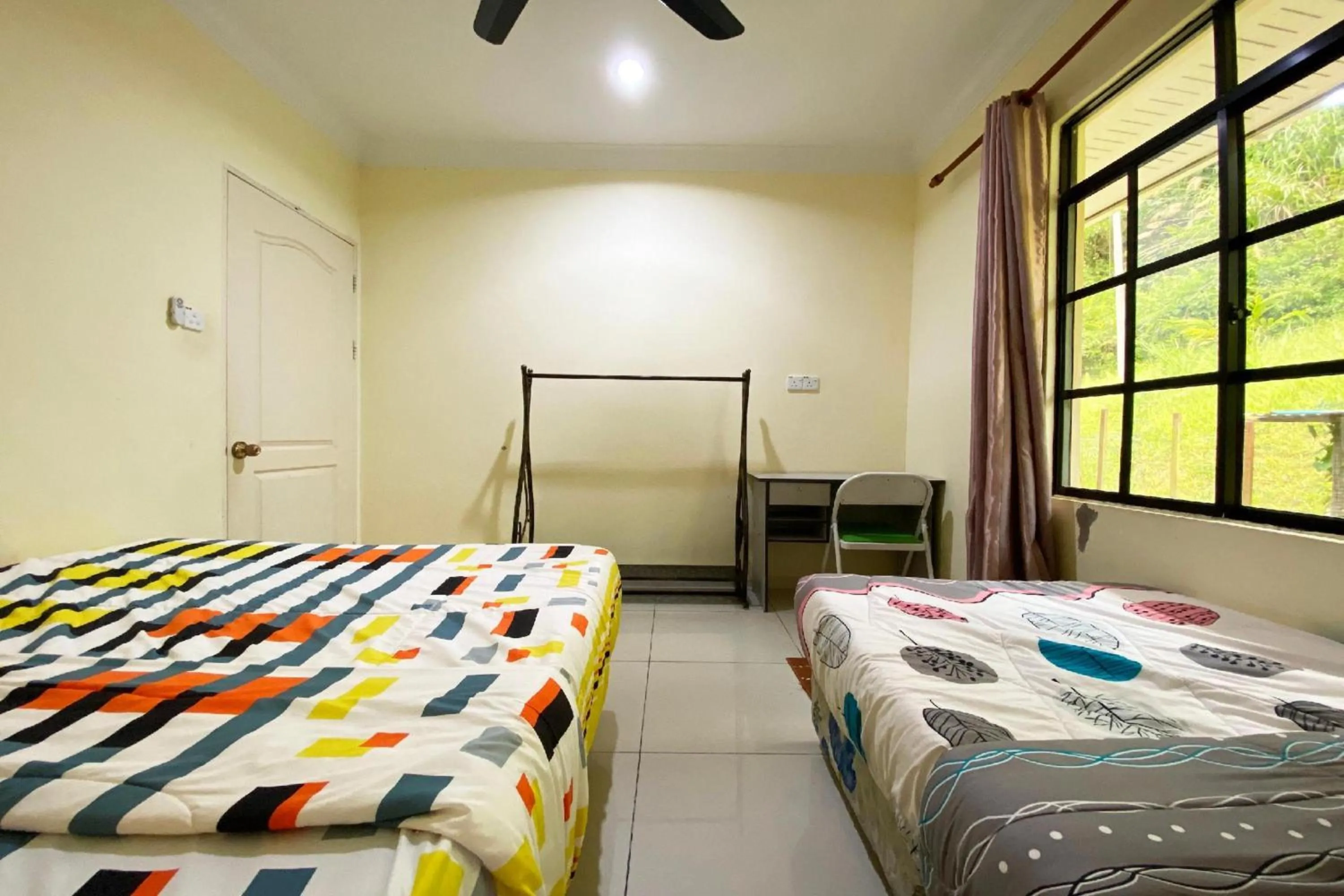 View (from property/room), Bed in Hotel O Tambunan Nature Lodge