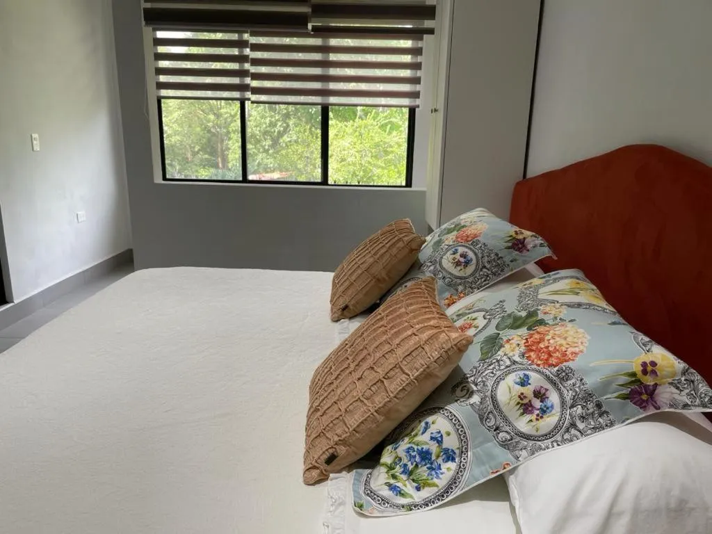 Bed in The Blue Eco Lodge