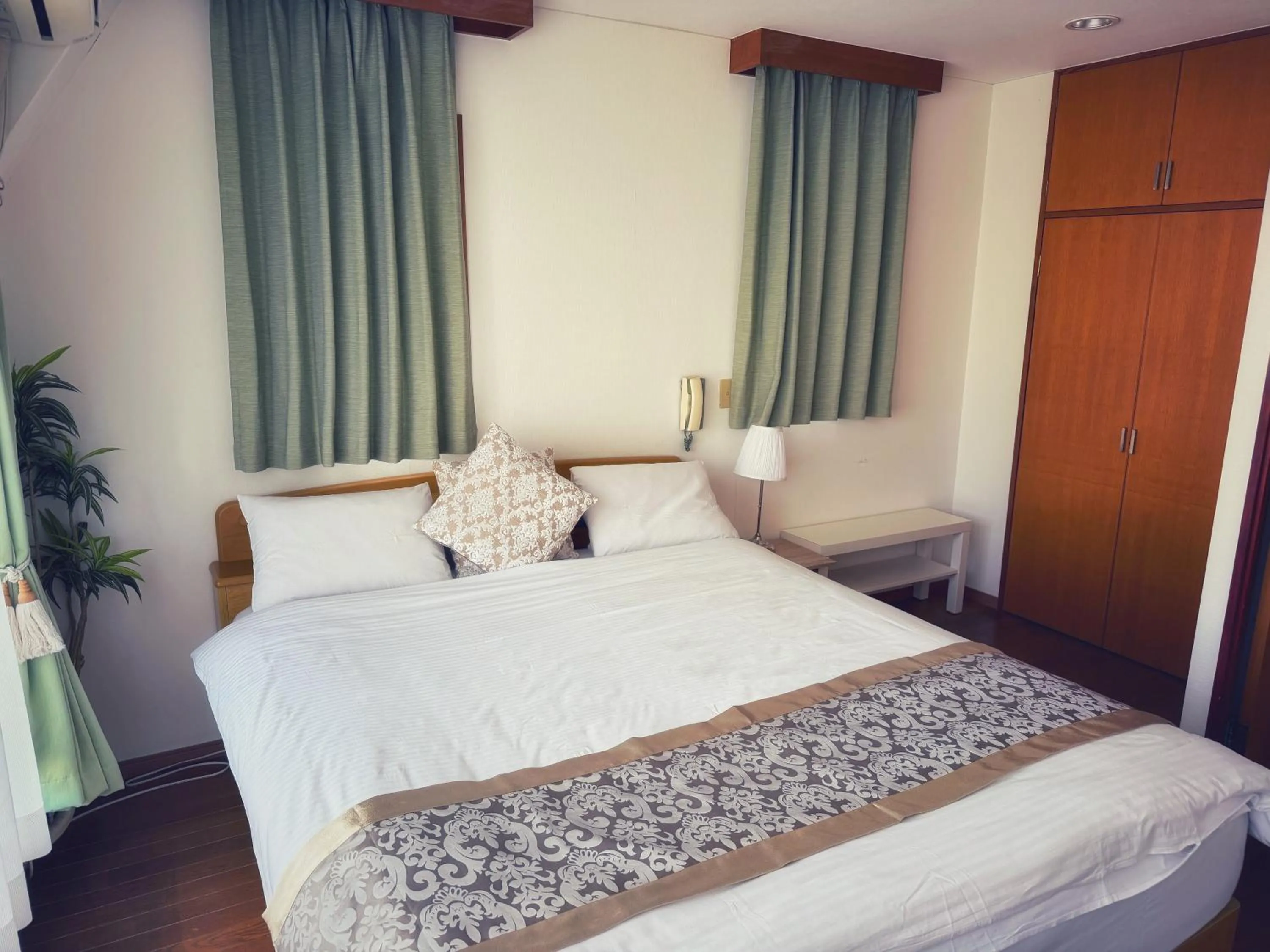 Bed in Uhome Ueno Hotel