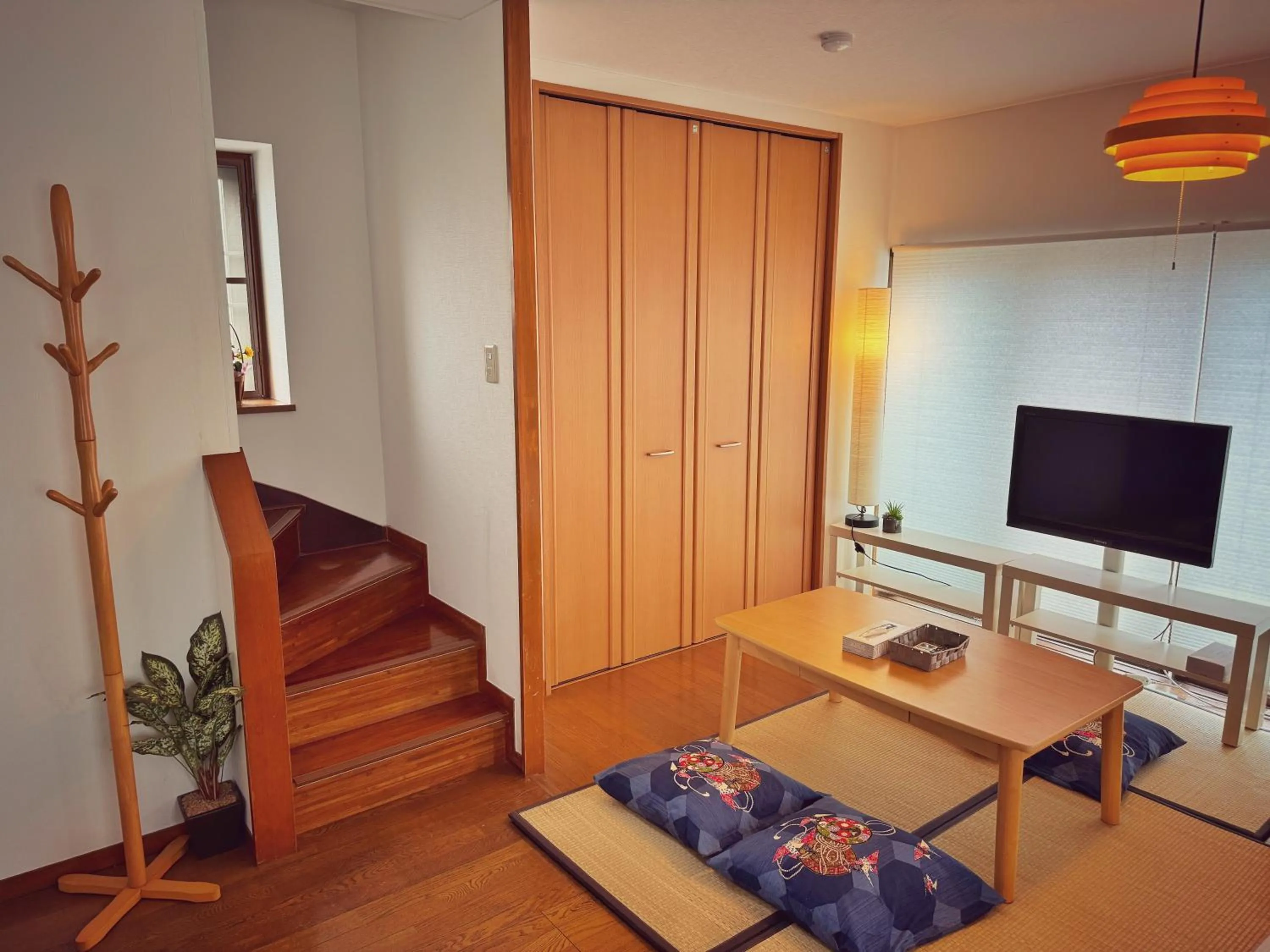 Communal lounge/ TV room in Uhome Ueno Hotel