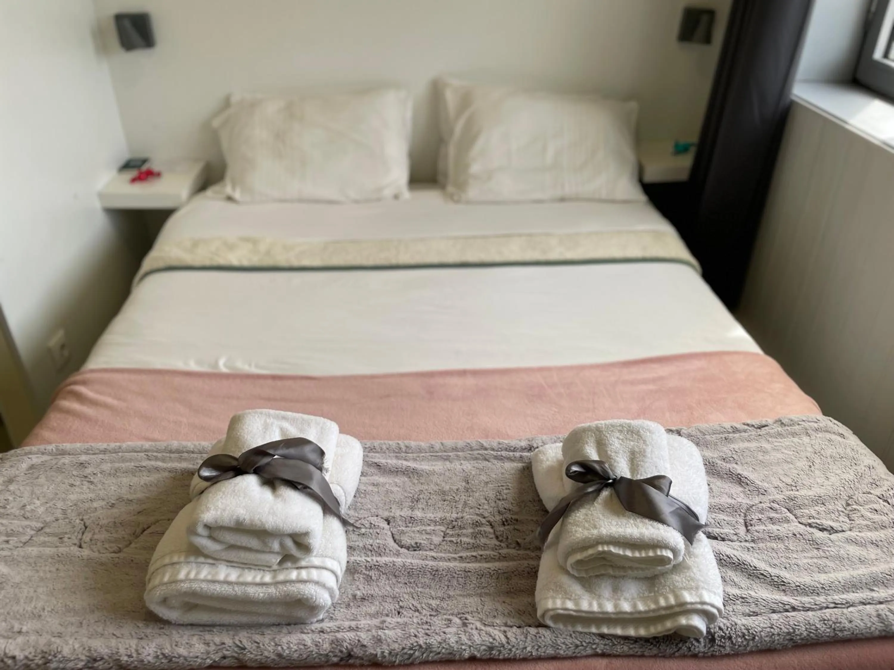 Bed in Liber Guest House