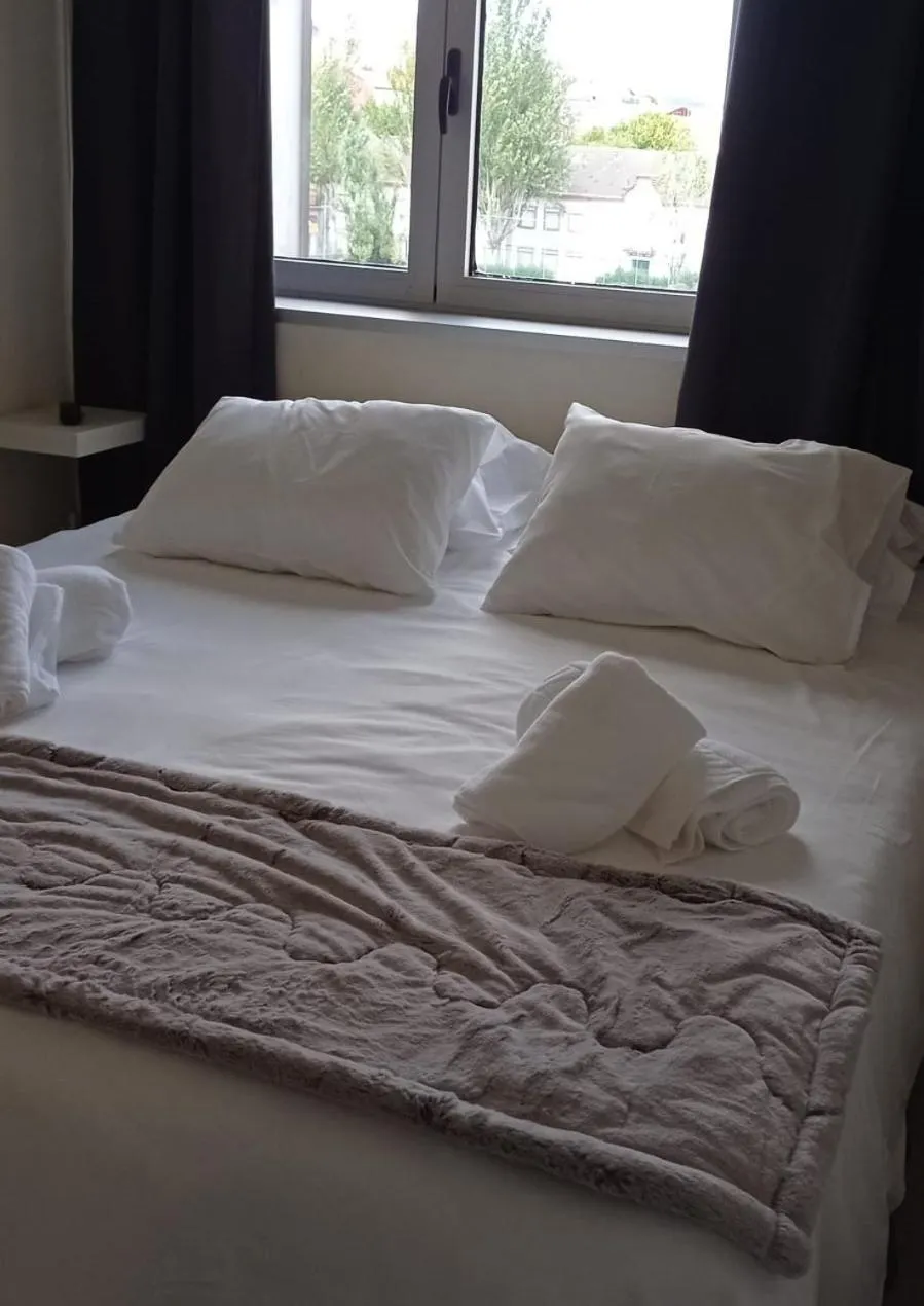 Bed in Liber Guest House