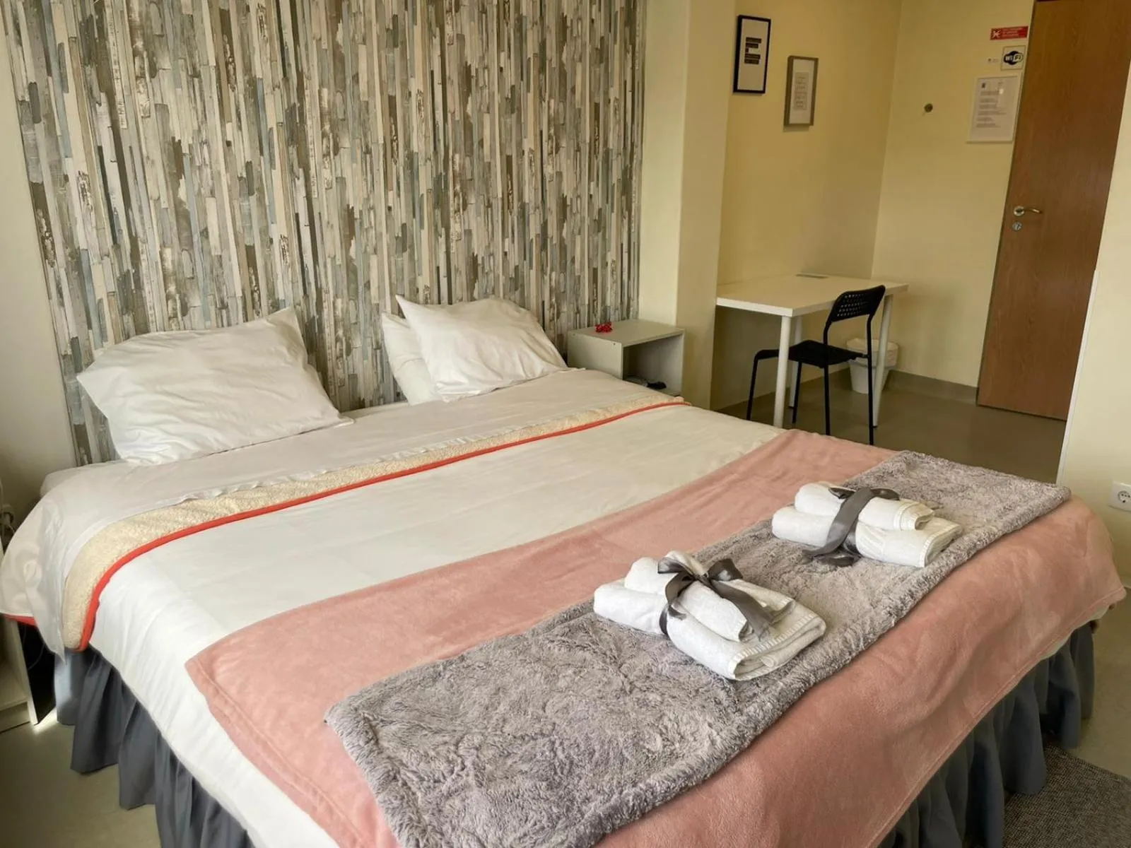 Bed in Liber Guest House