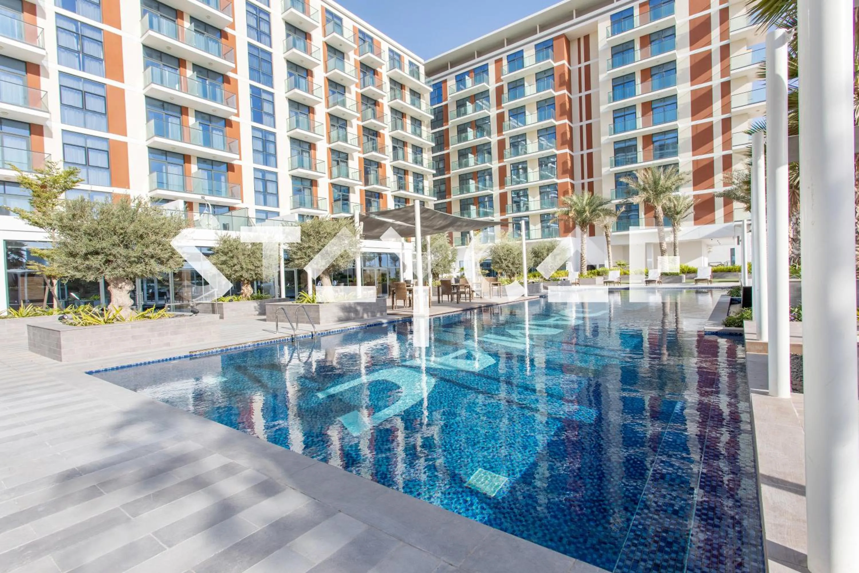Pool view in Staycae Holiday Homes - Celestia