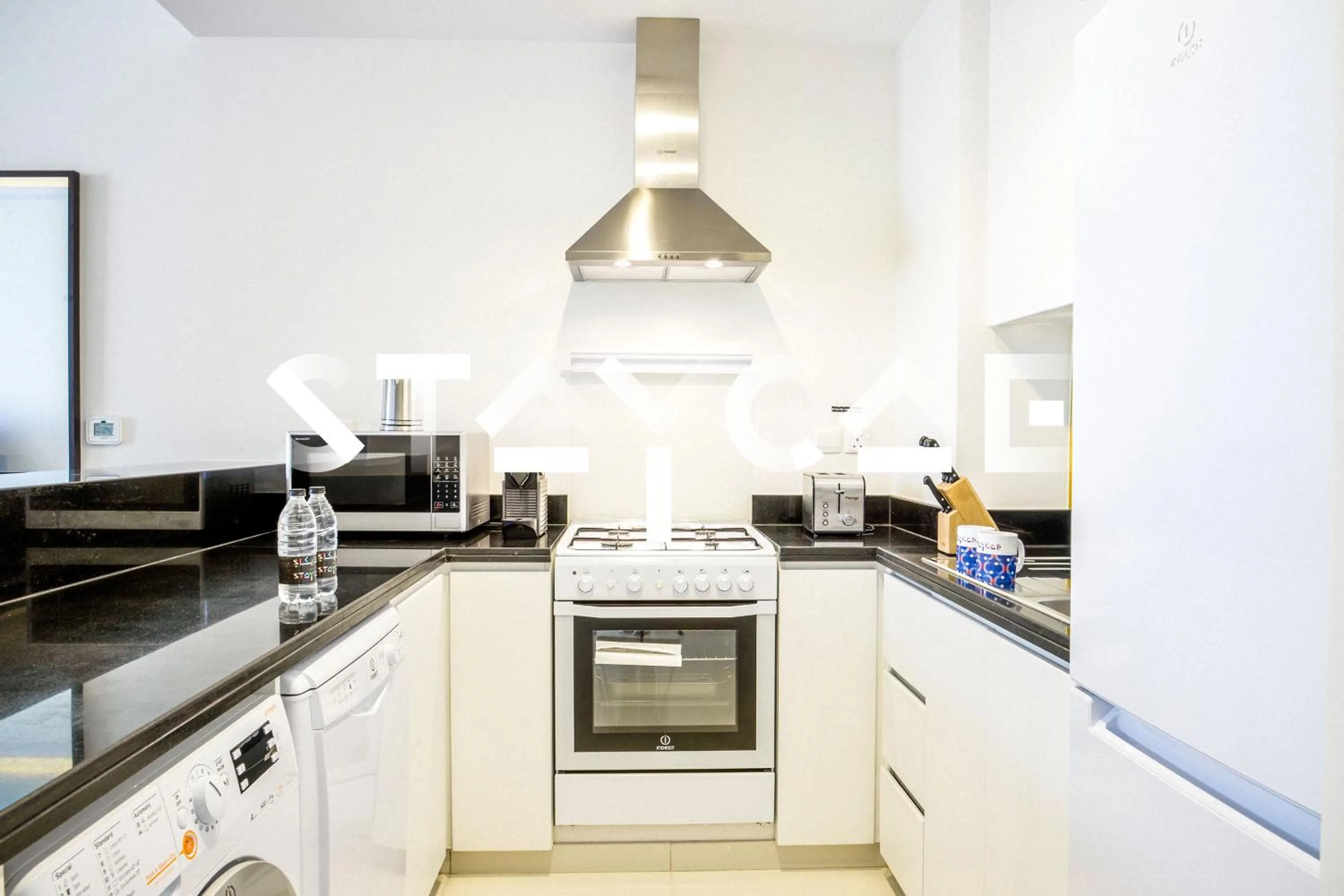 Kitchen or kitchenette in Staycae Holiday Homes - Celestia
