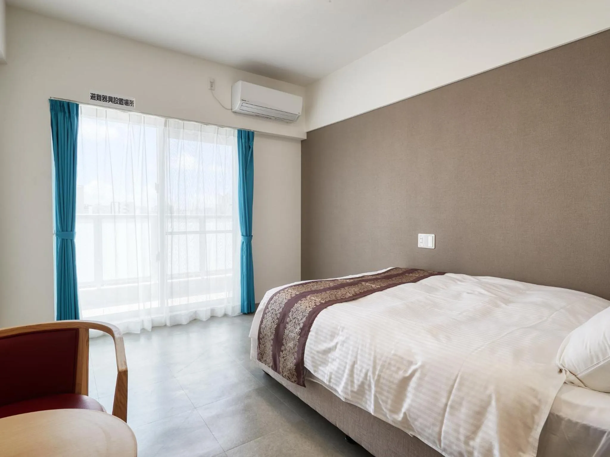 Bed in BiBi Hotel NAHA KUME