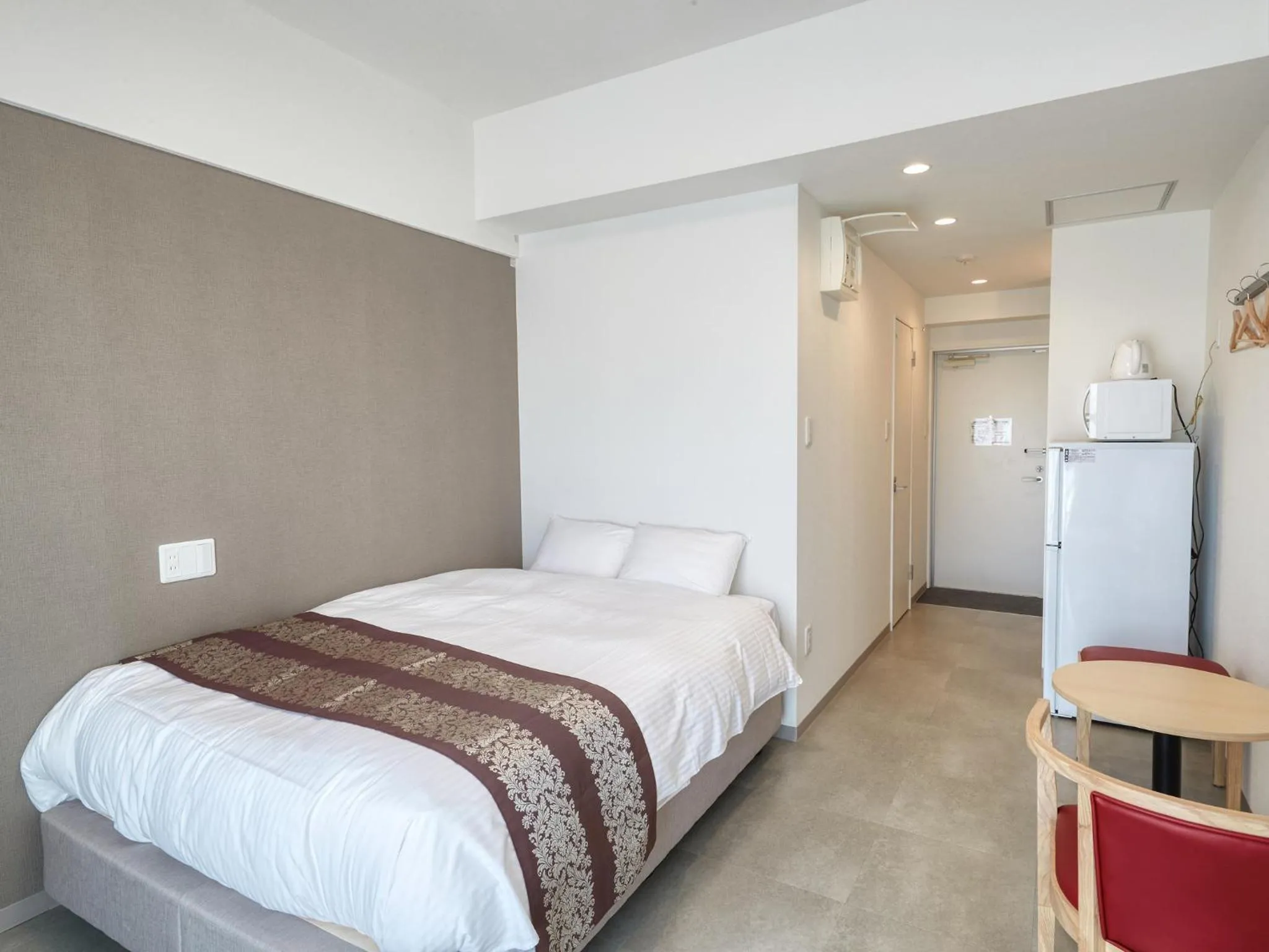 Bed in BiBi Hotel NAHA KUME